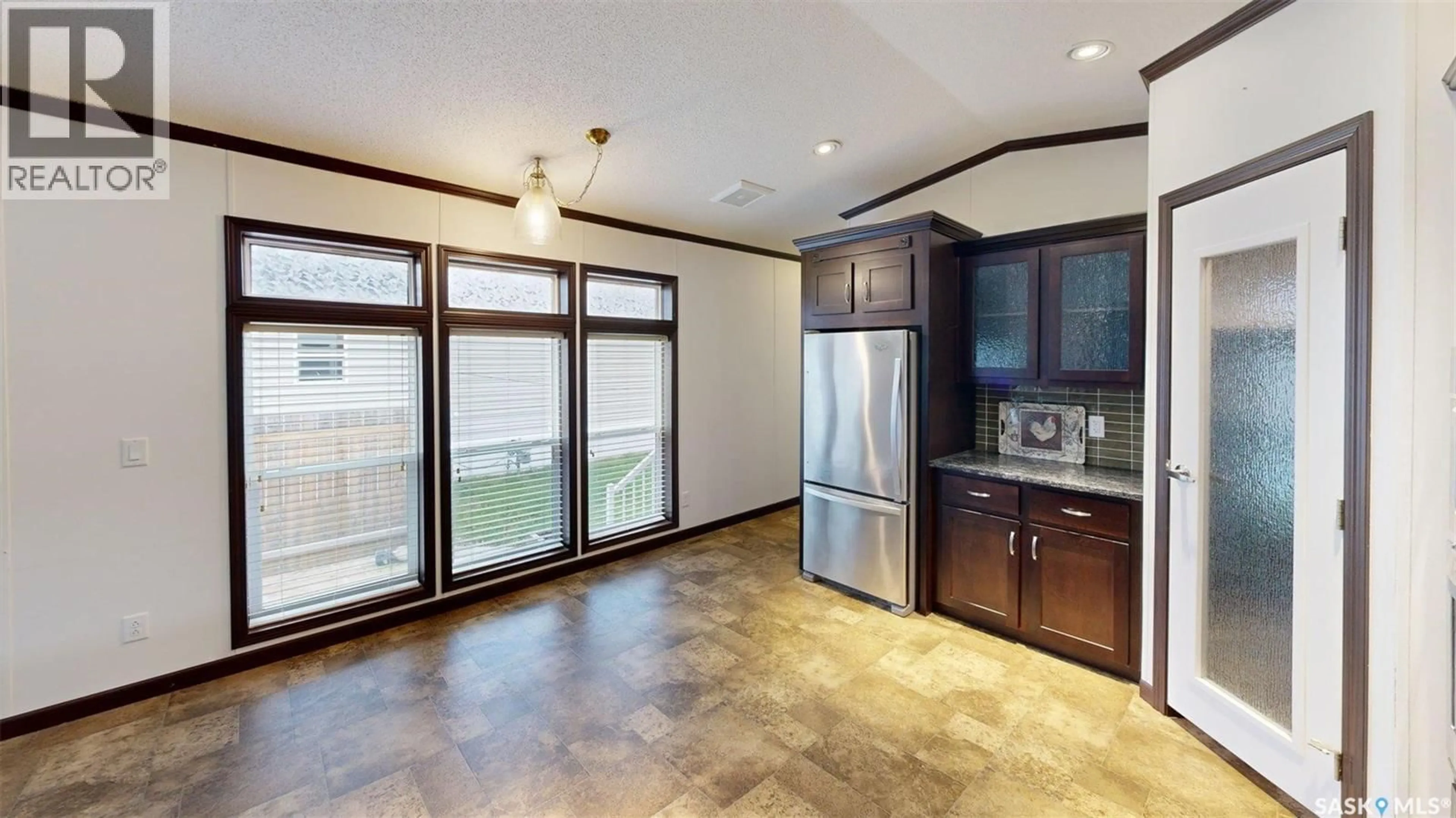 Open concept kitchen, unknown for 61 WALTERS COURT, Pilot Butte Saskatchewan S0G3Z0