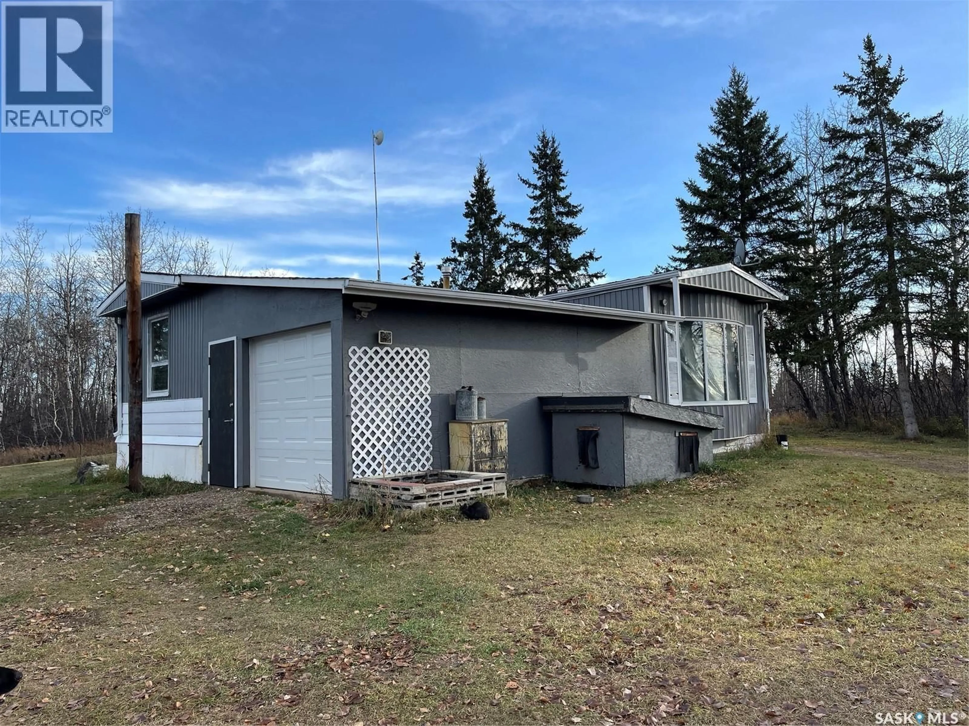 A pic from outside/outdoor area/front of a property/back of a property/a pic from drone, unknown for acreage - HWY 11, Prince Albert Rm No. 461 Saskatchewan S6V5S6