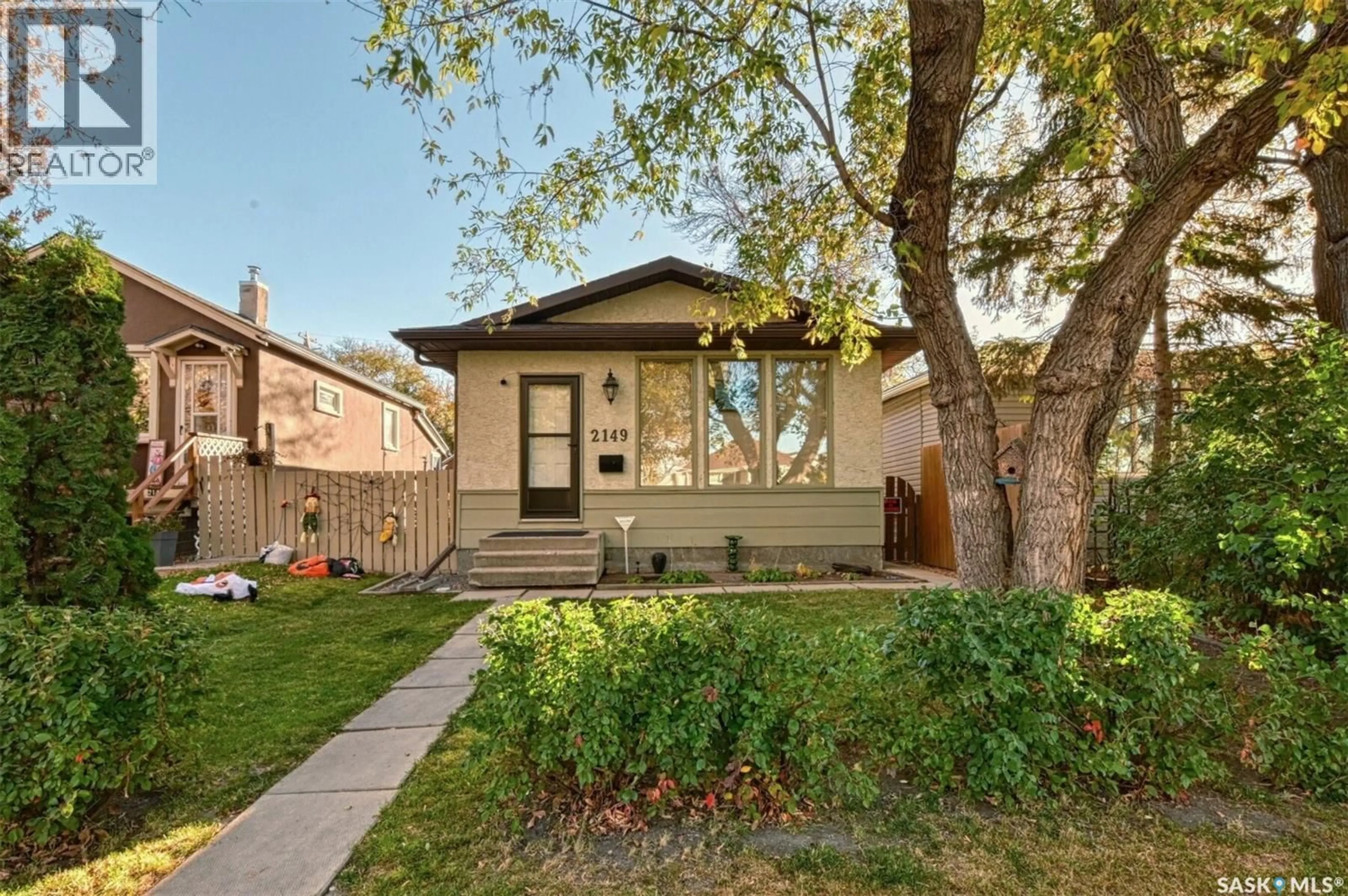 Home with brick exterior material, street for 2149 PASQUA STREET, Regina Saskatchewan S4T4M3