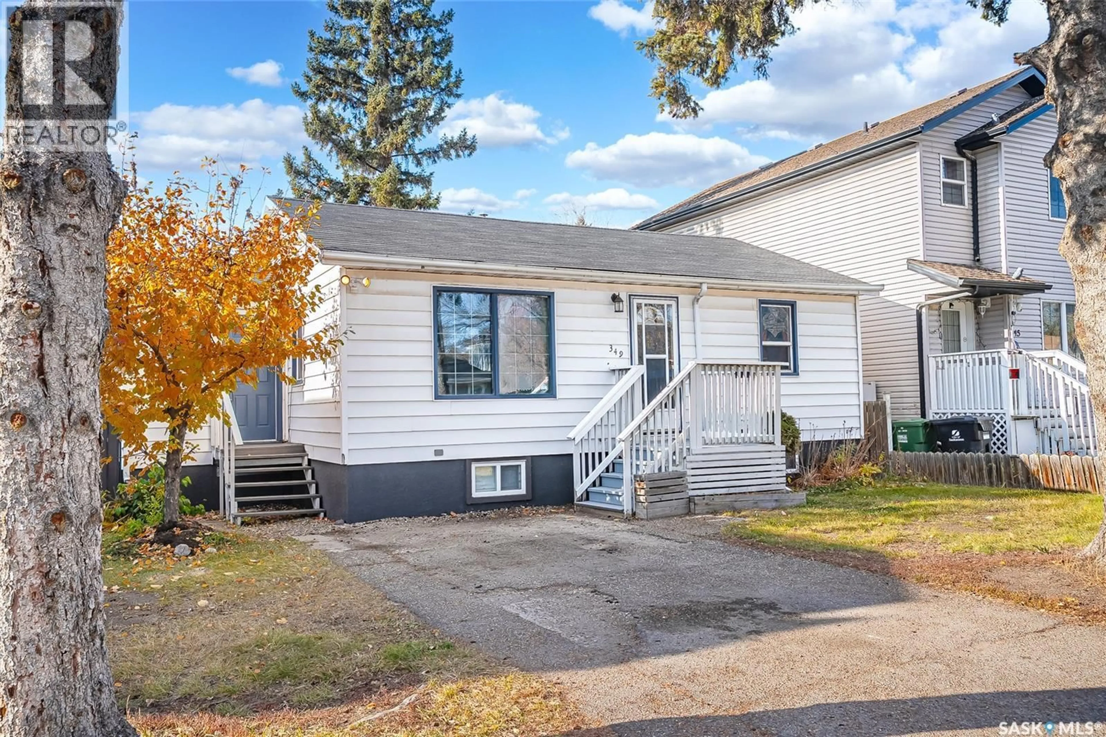 Home with vinyl exterior material, street for 349 V AVENUE, Saskatoon Saskatchewan S7M3E4