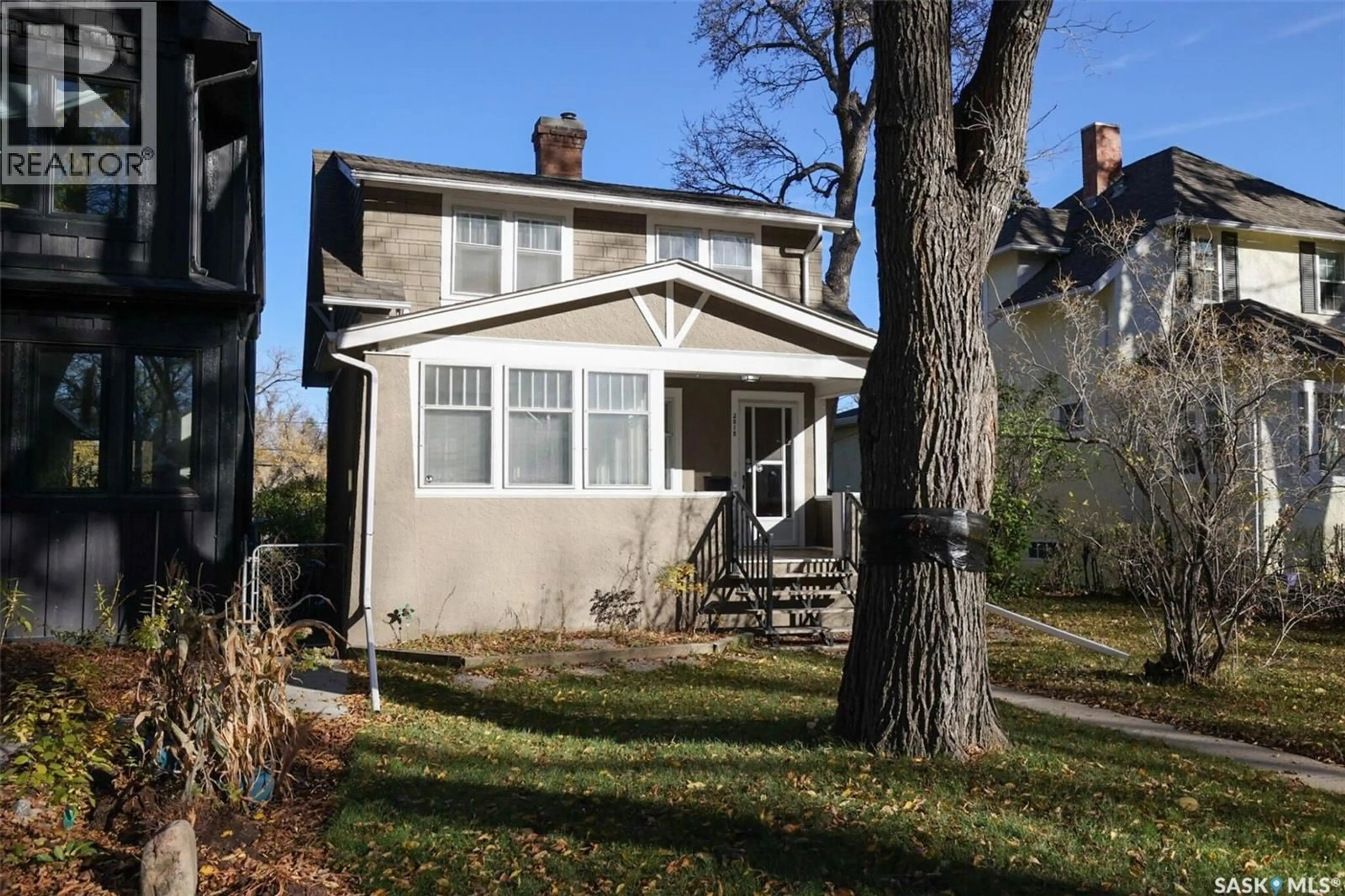 Home with vinyl exterior material, street for 2818 REGINA AVENUE, Regina Saskatchewan S4S0G5