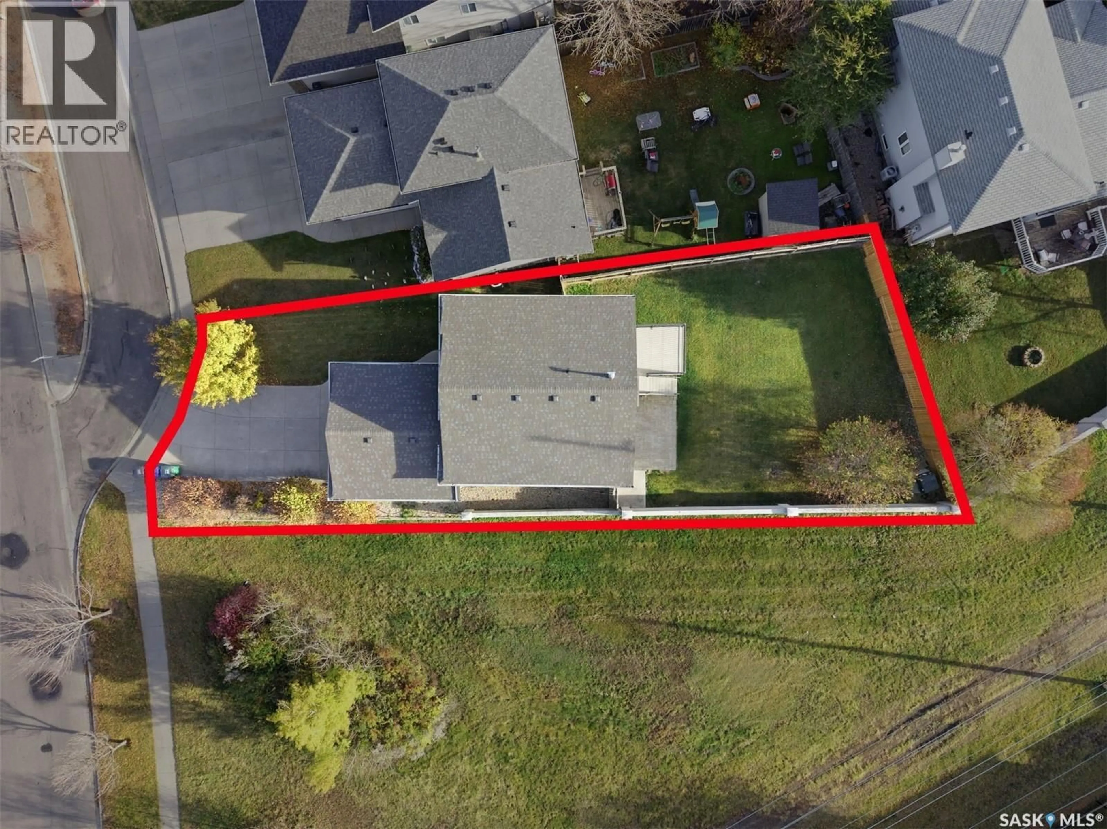 A pic from outside/outdoor area/front of a property/back of a property/a pic from drone, street for 710 KENDERDINE ROAD, Saskatoon Saskatchewan S7N4V8
