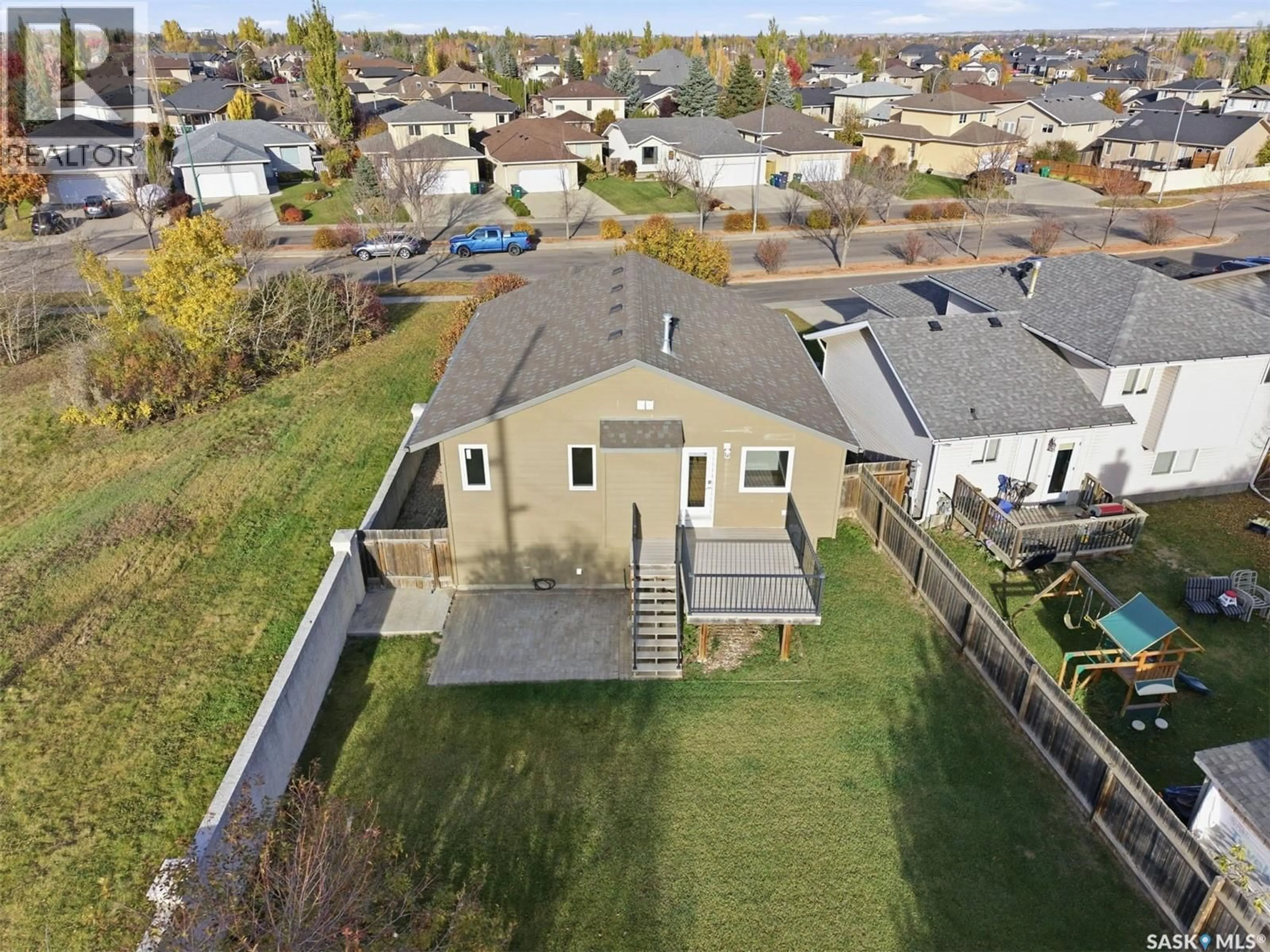 A pic from outside/outdoor area/front of a property/back of a property/a pic from drone, unknown for 710 KENDERDINE ROAD, Saskatoon Saskatchewan S7N4V8
