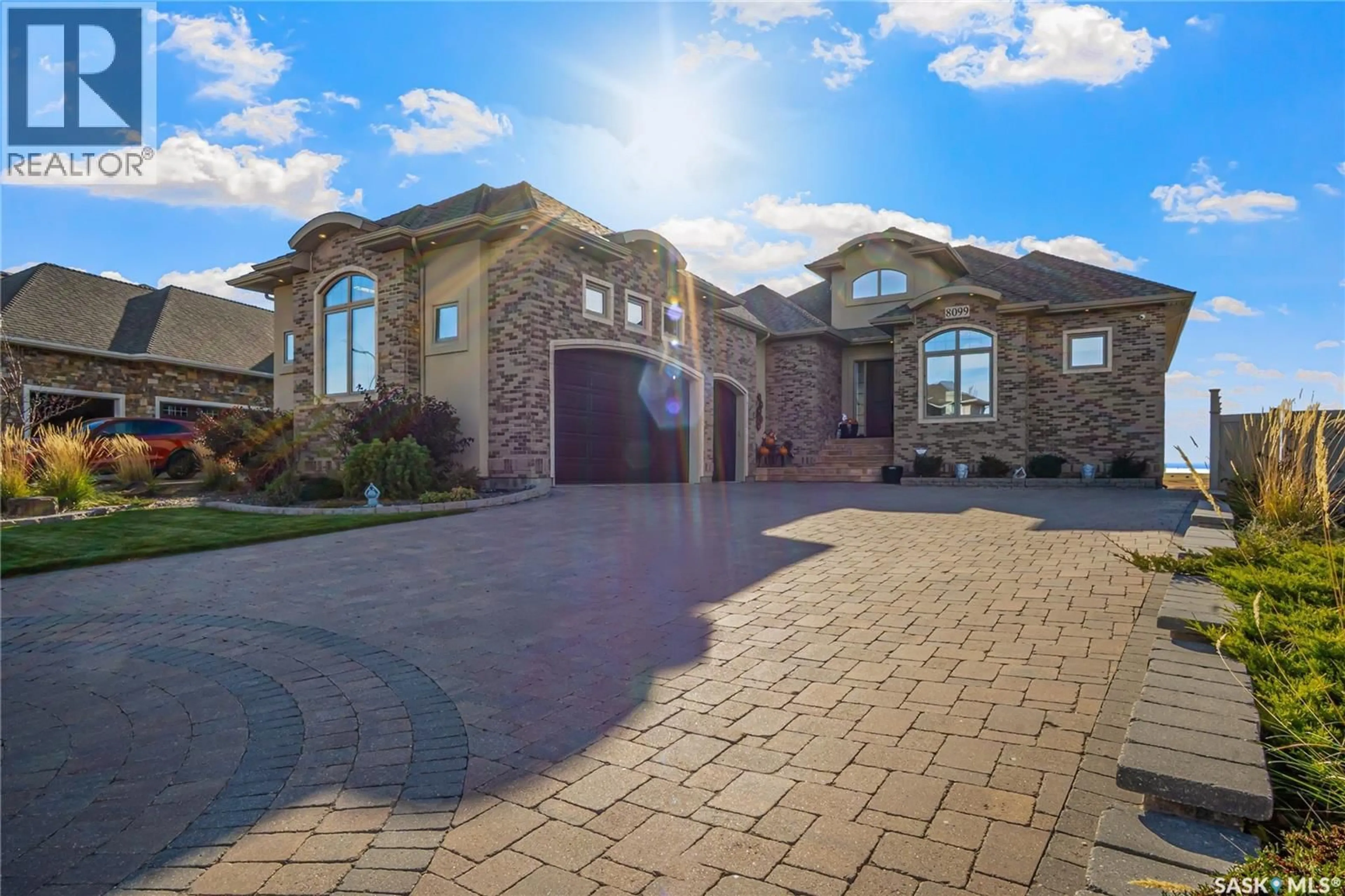 Home with brick exterior material, street for 8099 WASCANA GARDENS CRESCENT, Regina Saskatchewan S4V1G2