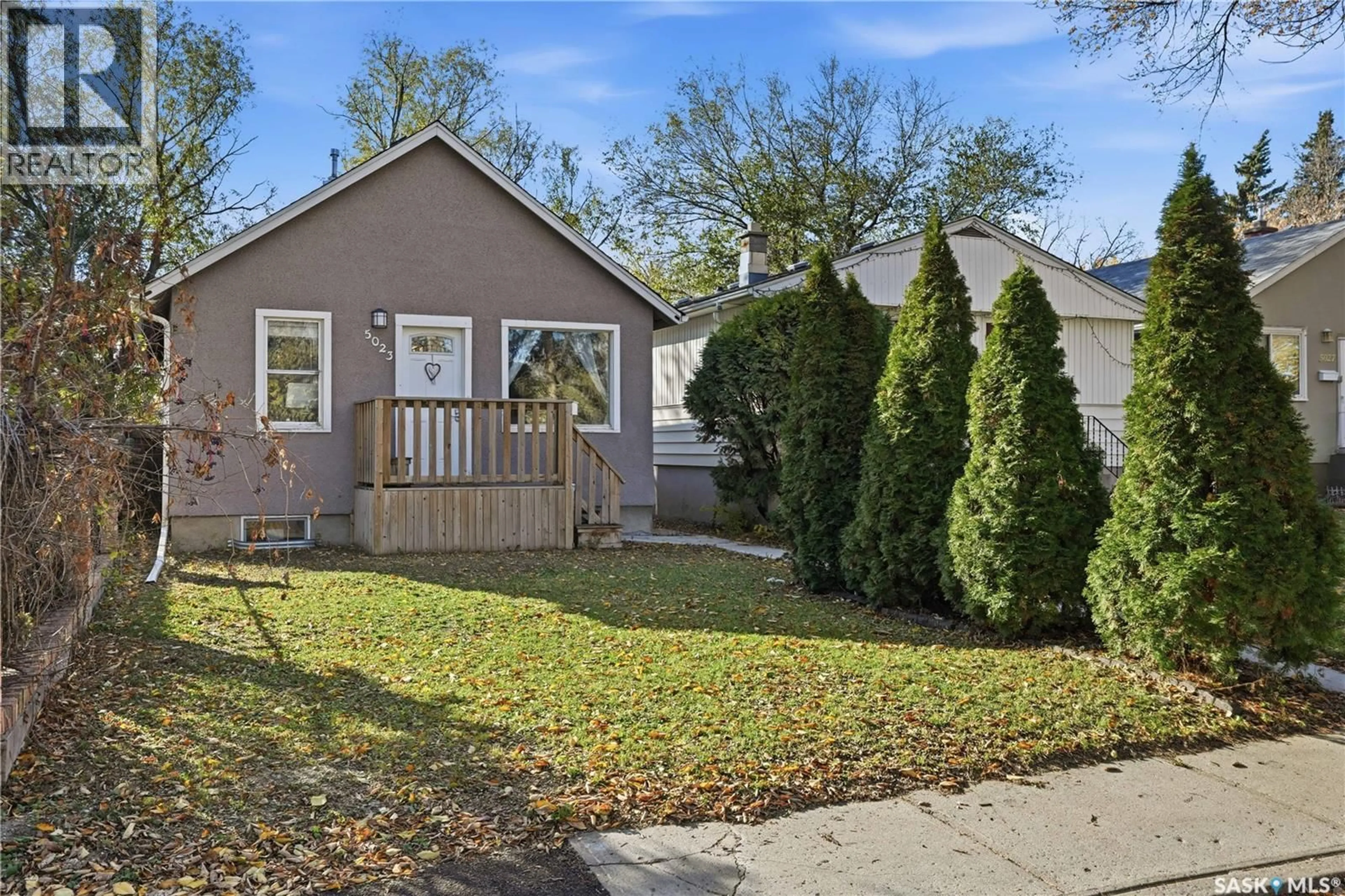 Home with vinyl exterior material, street for 5023 8TH AVENUE, Regina Saskatchewan S4T0W4