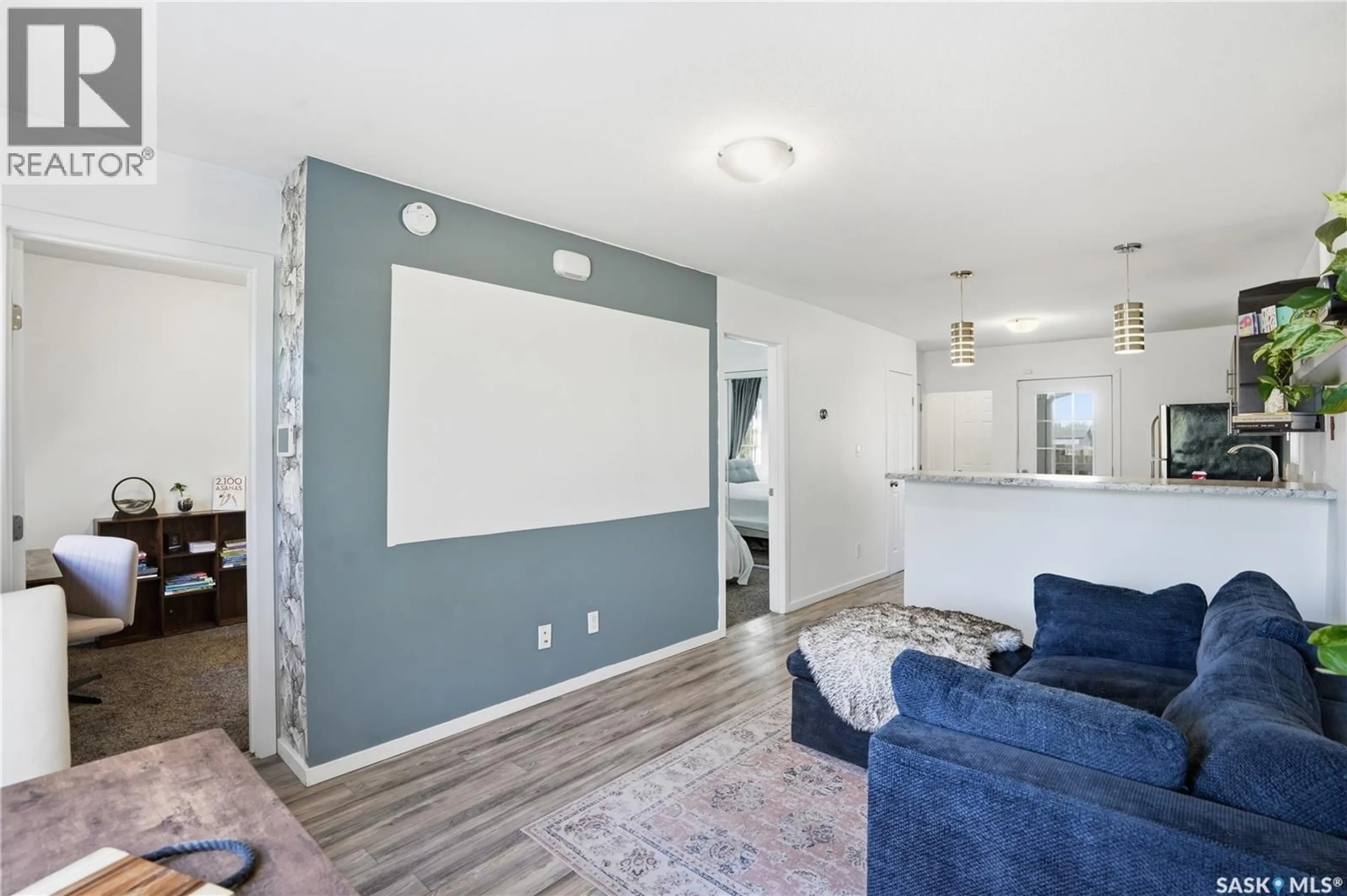 Living room with furniture, unknown for 5023 8TH AVENUE, Regina Saskatchewan S4T0W4