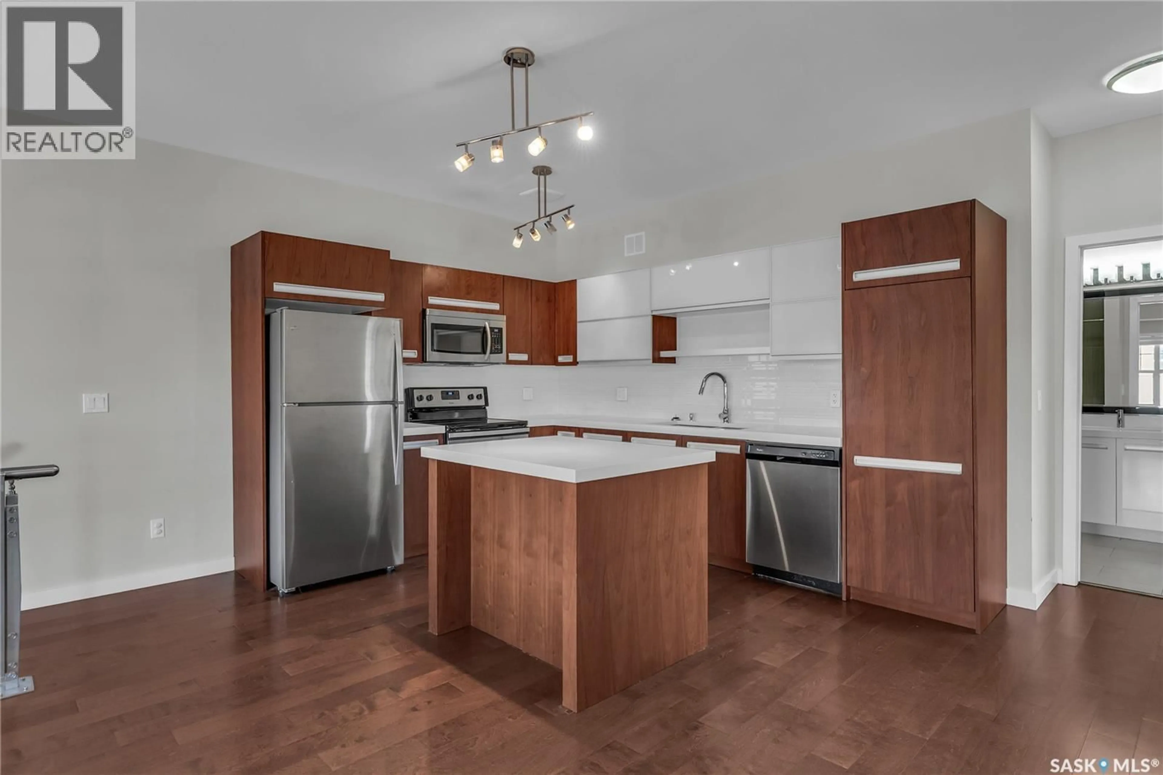 Open concept kitchen, wood/laminate floor for 2315 - 230 MCCLOCKLIN ROAD, Saskatoon Saskatchewan S7R0K8