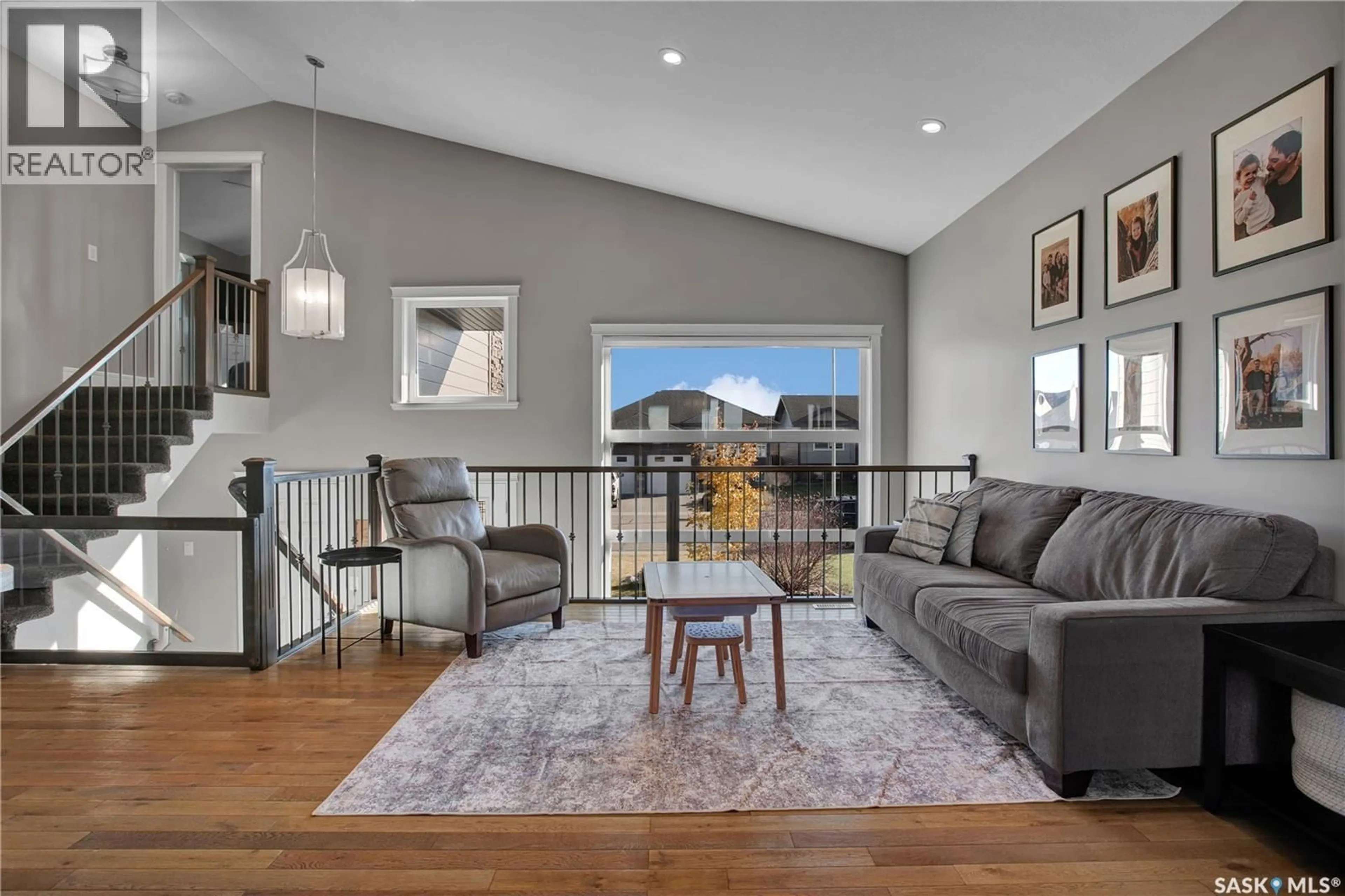 Living room with furniture, unknown for 511 COUPLES COURT, Warman Saskatchewan S0K4S1