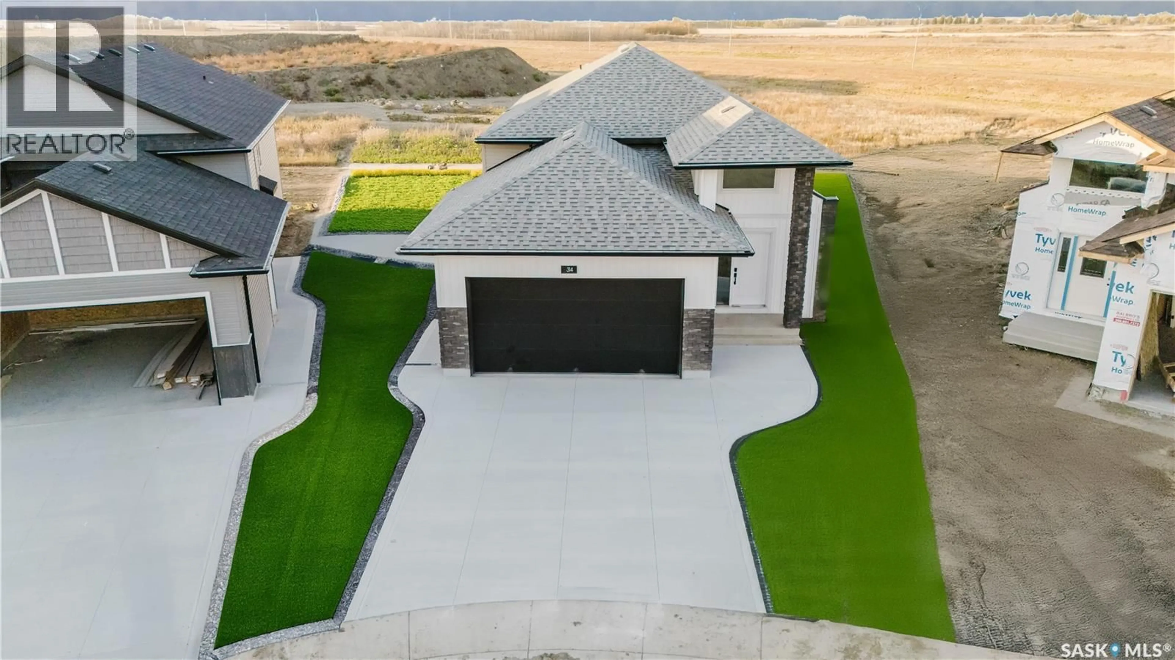 A pic from outside/outdoor area/front of a property/back of a property/a pic from drone, unknown for 438 STROMBERG CRESCENT, Saskatoon Saskatchewan S7L7N7