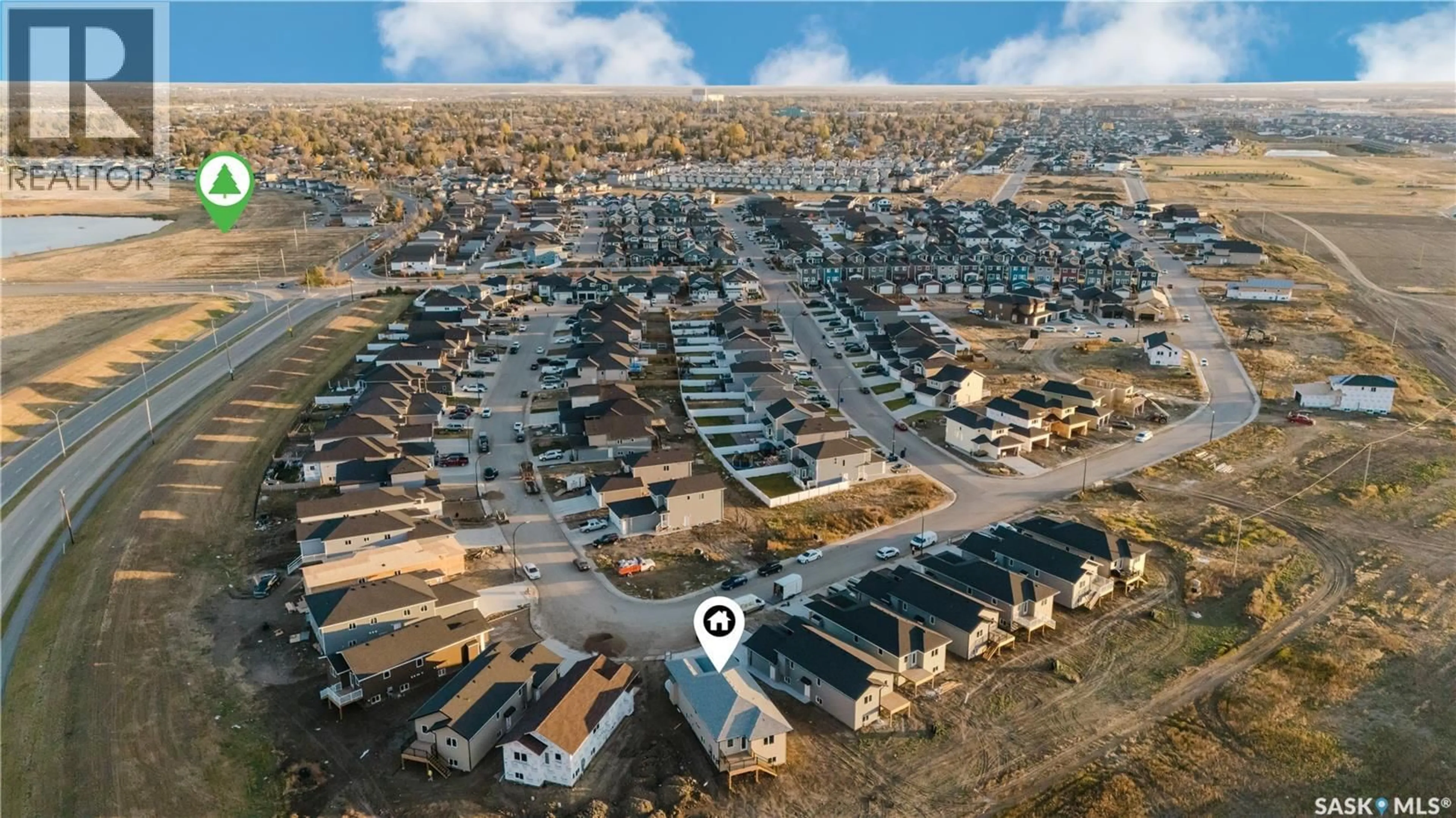 A pic from outside/outdoor area/front of a property/back of a property/a pic from drone, street for 438 STROMBERG CRESCENT, Saskatoon Saskatchewan S7L7N7