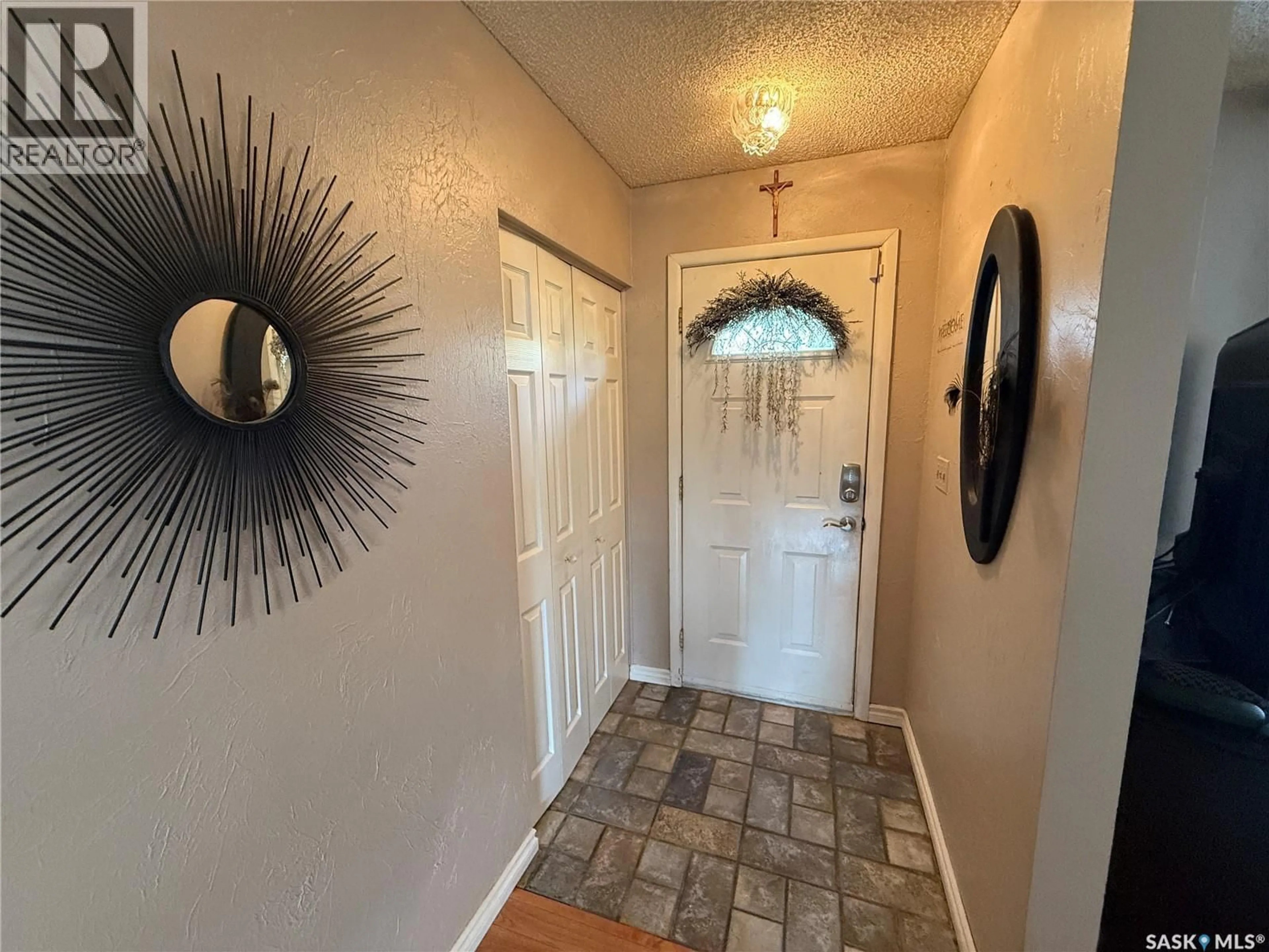 Indoor entryway for 216 ASH DRIVE, Weyburn Saskatchewan S4H0S2