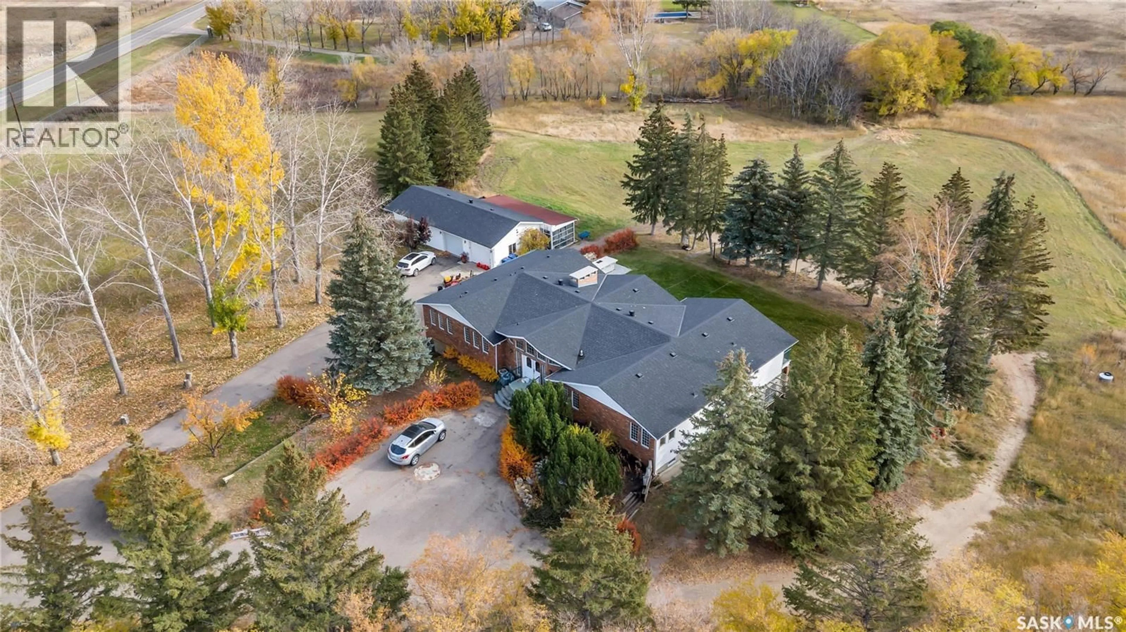 A pic from outside/outdoor area/front of a property/back of a property/a pic from drone, unknown for 280 GRASSWOOD ROAD, Corman Park Rm No. 344 Saskatchewan S7T1A6