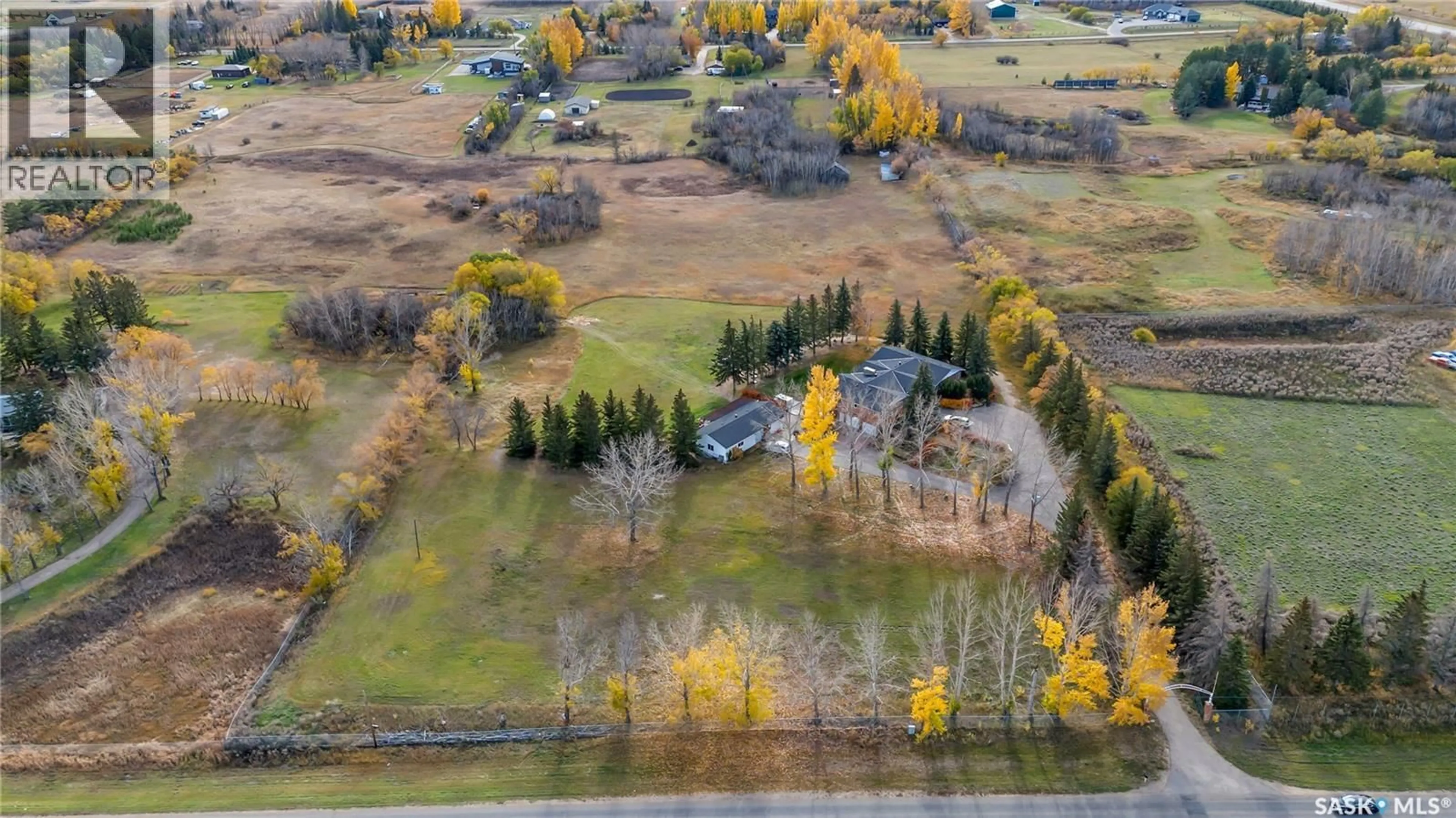 A pic from outside/outdoor area/front of a property/back of a property/a pic from drone, unknown for 280 GRASSWOOD ROAD, Corman Park Rm No. 344 Saskatchewan S7T1A6