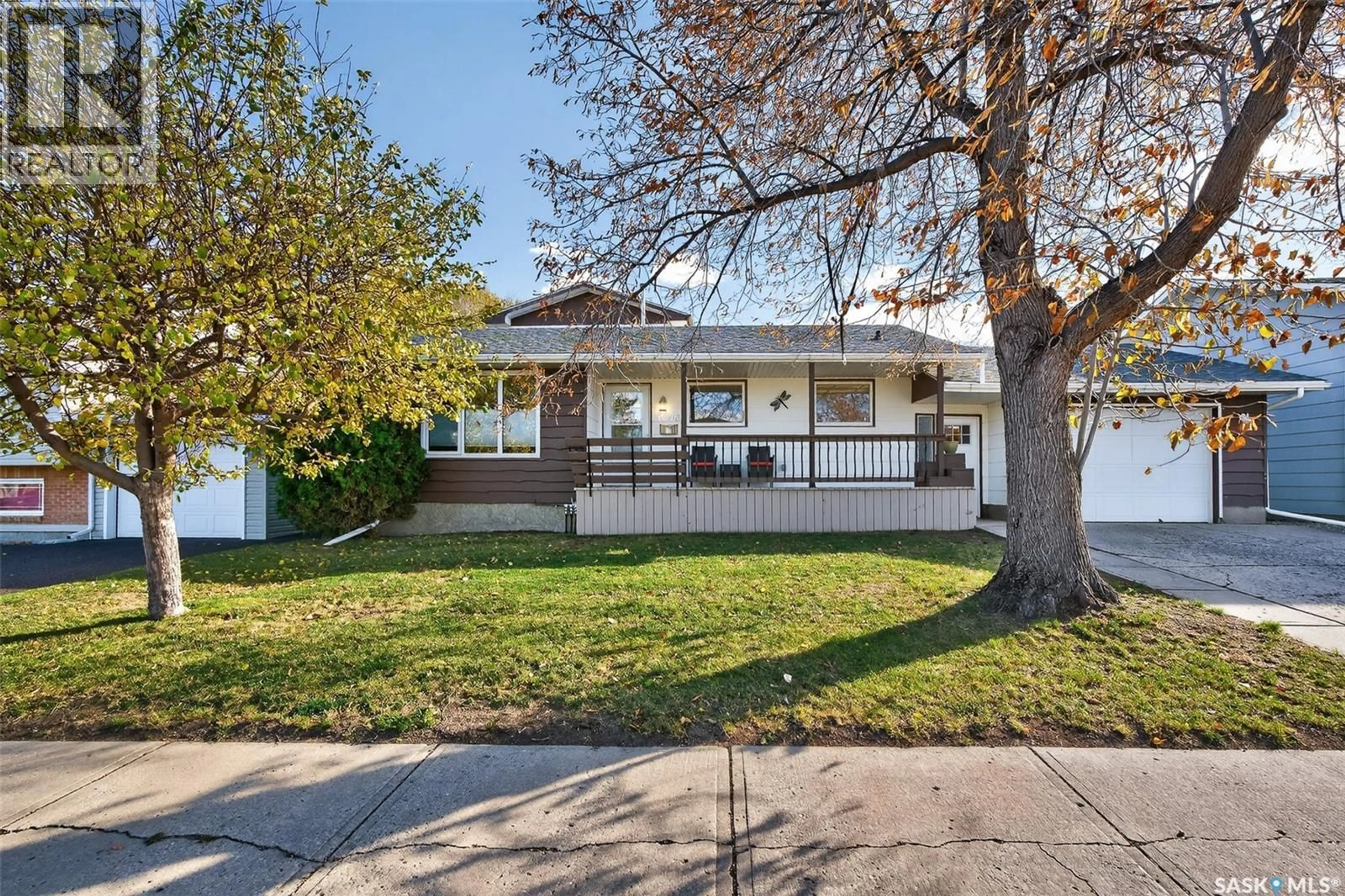 Home with vinyl exterior material, street for 1305 PRINCESS CRESCENT, Moose Jaw Saskatchewan S6H6V7