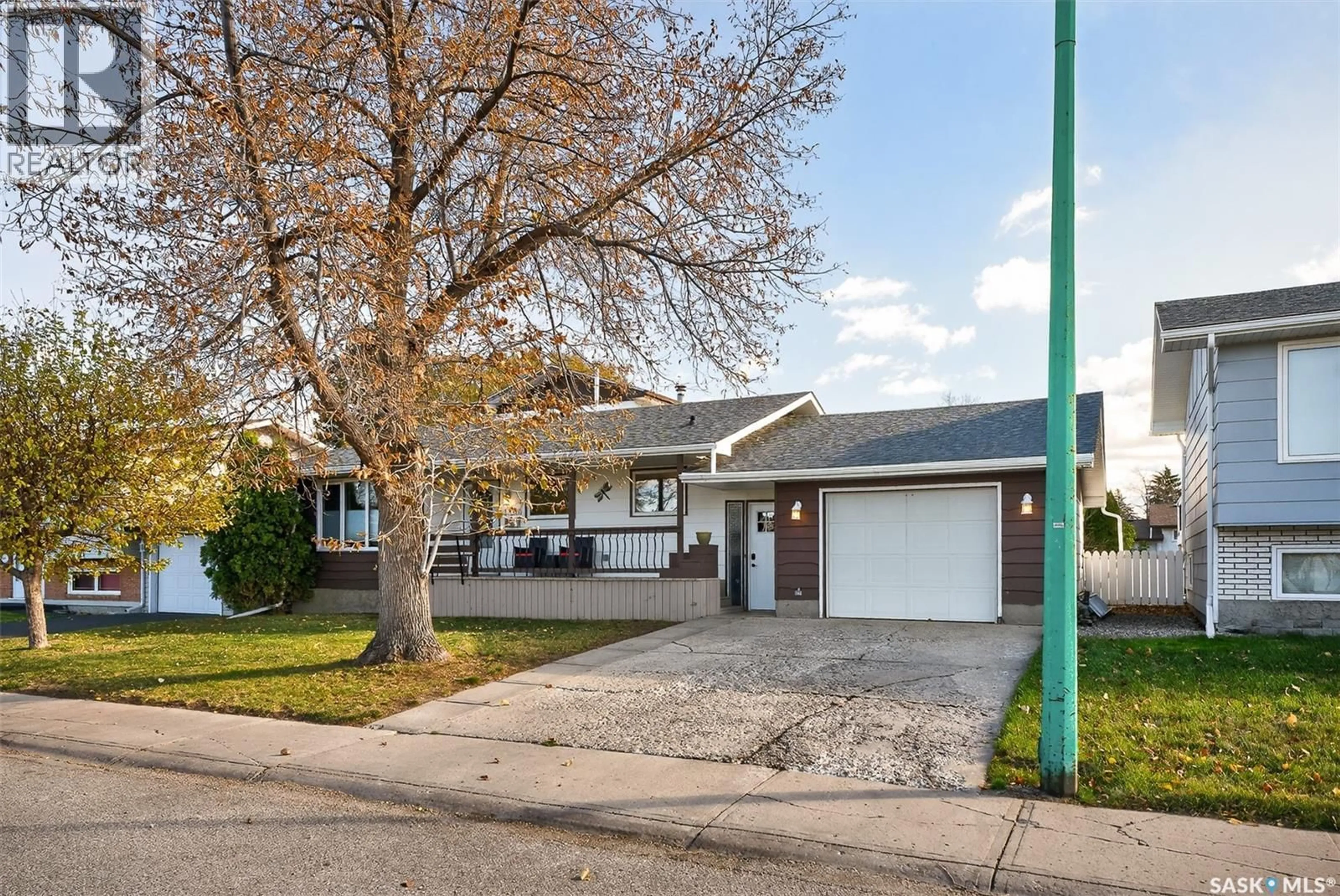 Home with vinyl exterior material, street for 1305 PRINCESS CRESCENT, Moose Jaw Saskatchewan S6H6V7