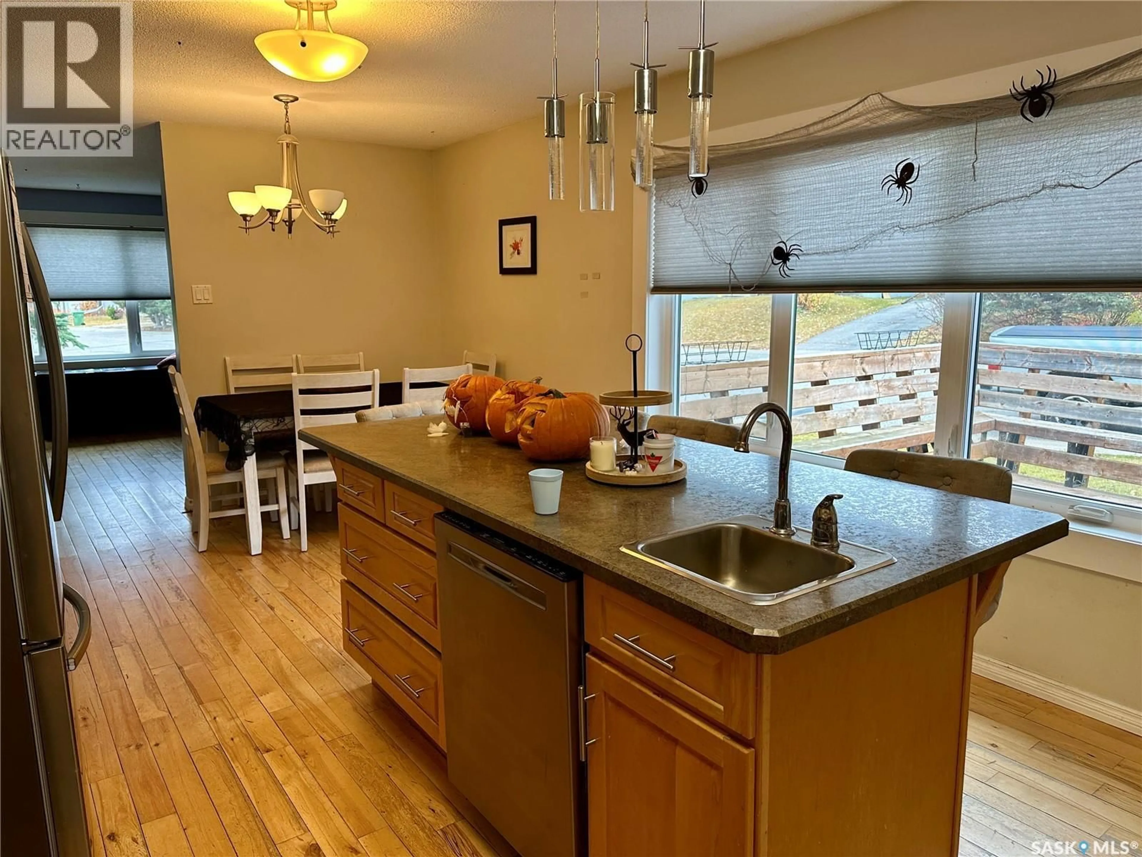 Open concept kitchen, unknown for 524 GIBSON STREET, La Ronge Saskatchewan S0J1L0