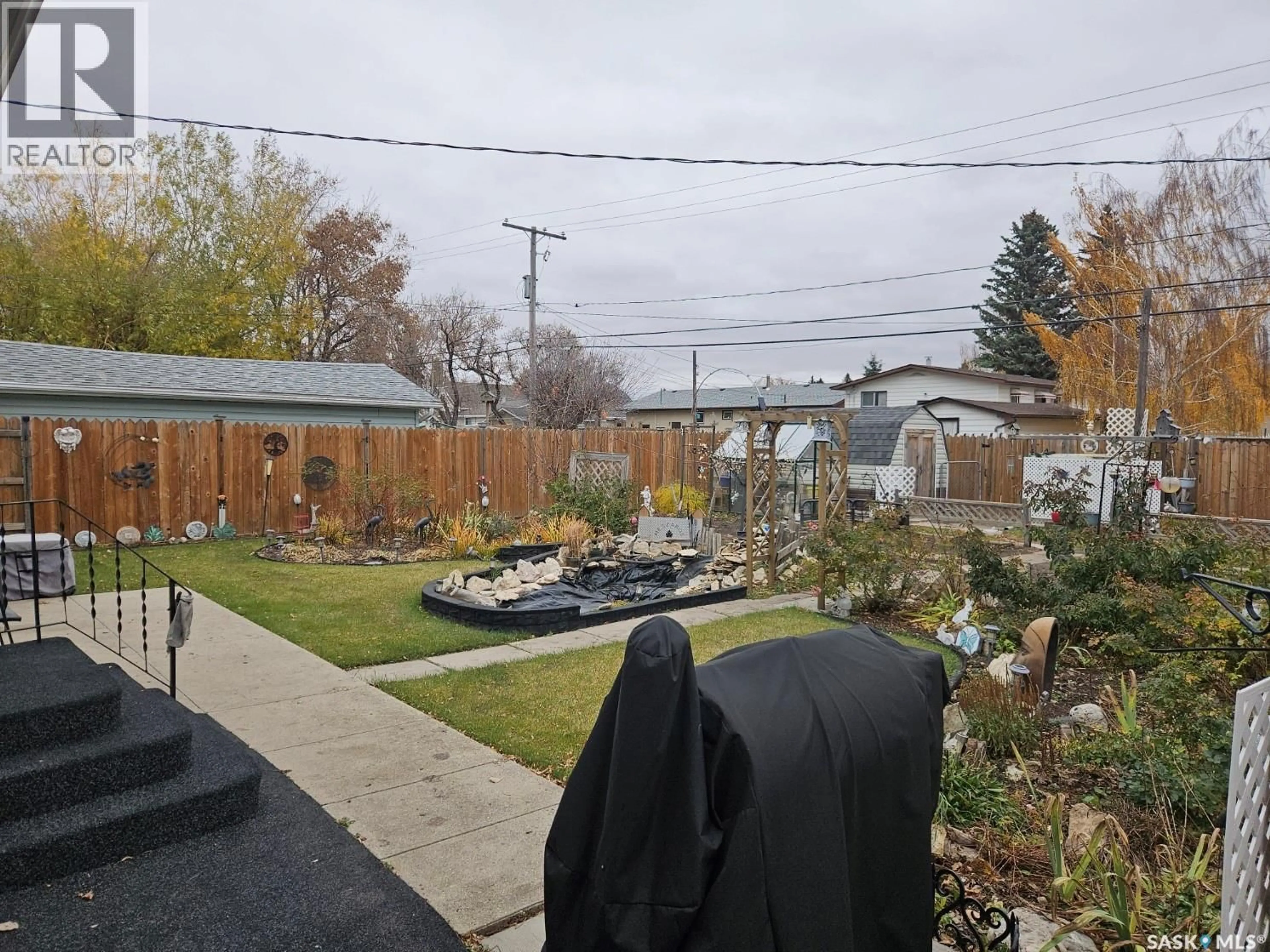A pic from outside/outdoor area/front of a property/back of a property/a pic from drone, street for 820 14TH STREET, Humboldt Saskatchewan S0K2A0