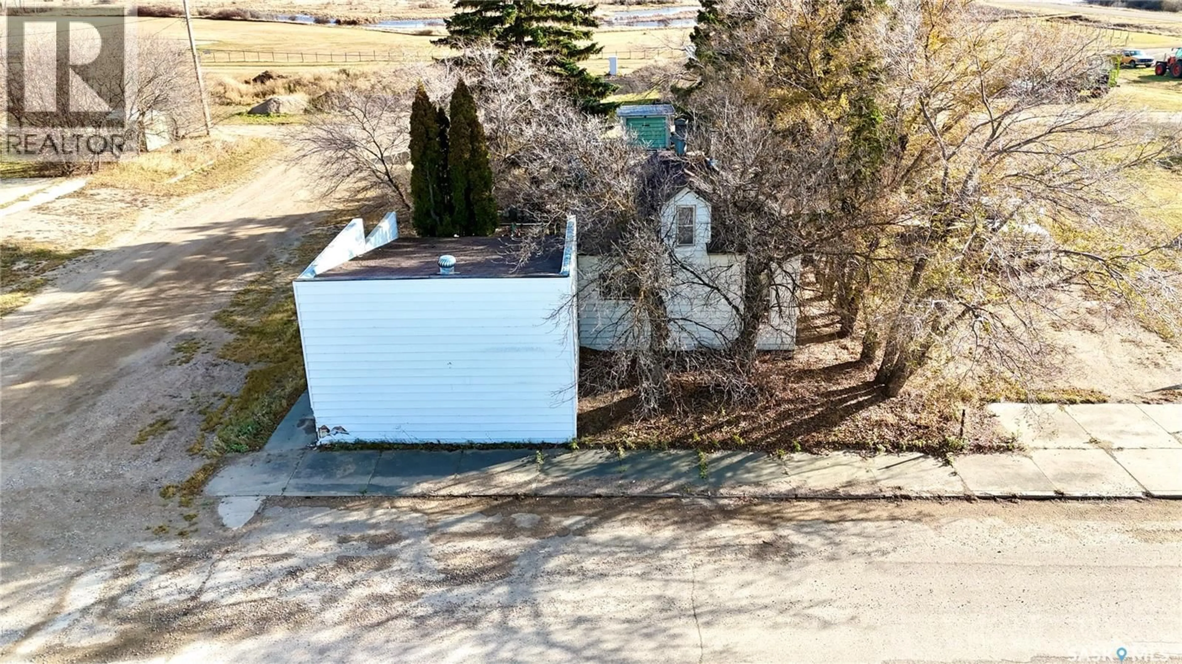 A pic from outside/outdoor area/front of a property/back of a property/a pic from drone, unknown for 400 CENTRAL AVENUE, Kenaston Saskatchewan S0G2N0