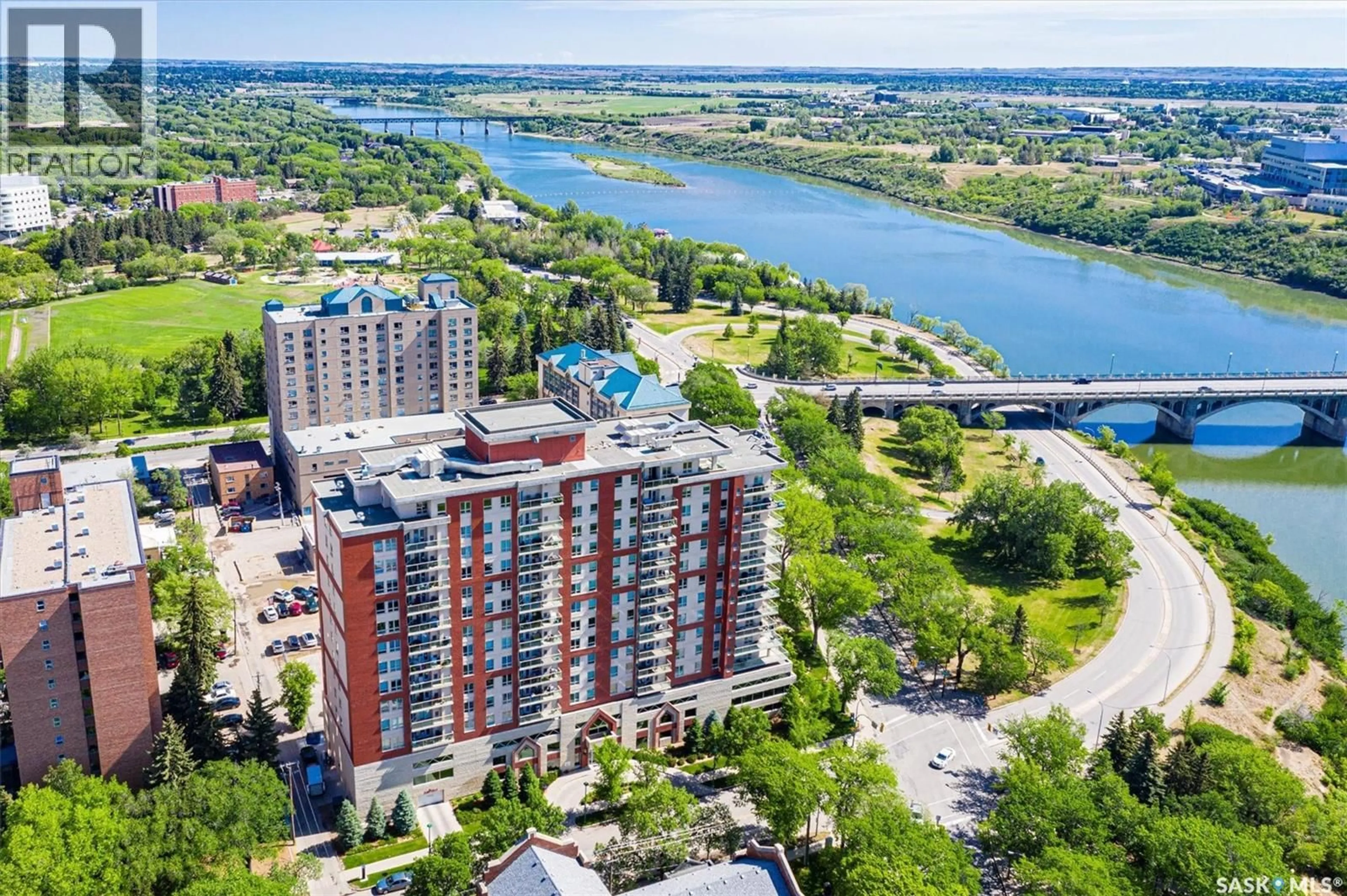 A pic from outside/outdoor area/front of a property/back of a property/a pic from drone, water/lake/river/ocean view for 902 - 702 SPADINA CRESCENT, Saskatoon Saskatchewan S7K0G8