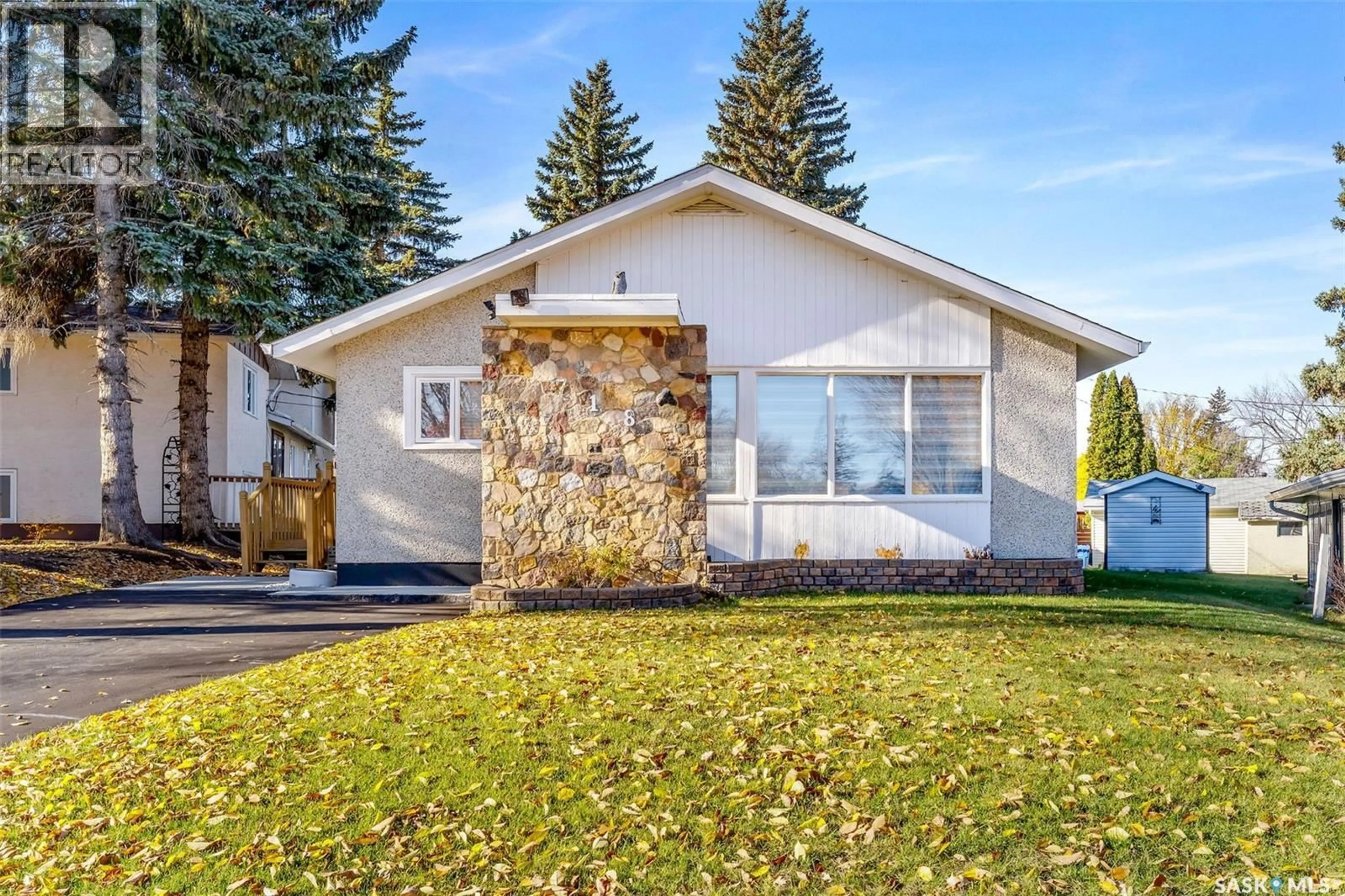 Home with vinyl exterior material, street for 718 CUELENAERE STREET, Prince Albert Saskatchewan S6V2S9