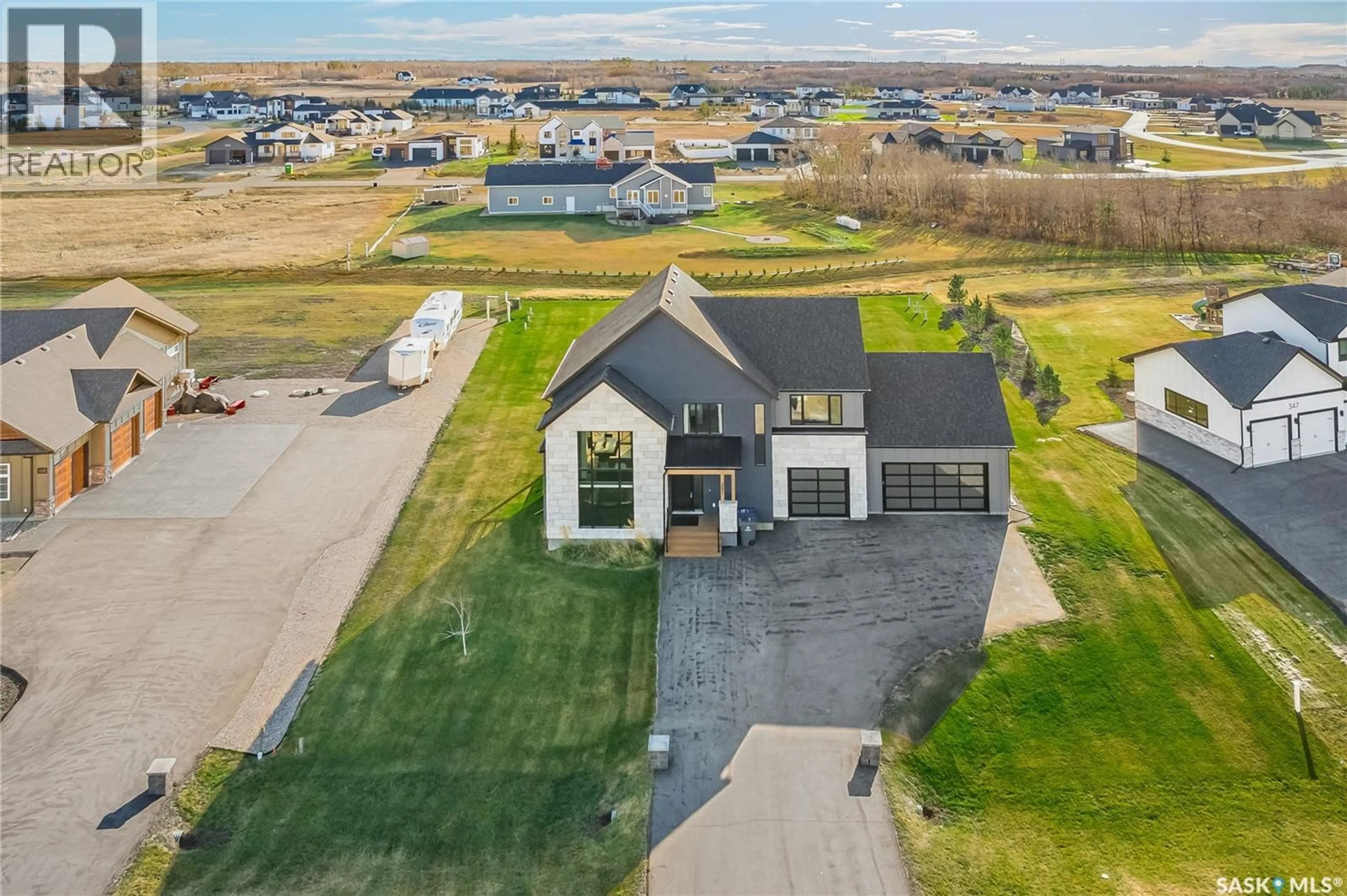 A pic from outside/outdoor area/front of a property/back of a property/a pic from drone, street for 351 EDGEMONT CRESCENT, Corman Park Rm No. 344 Saskatchewan S7T1A2