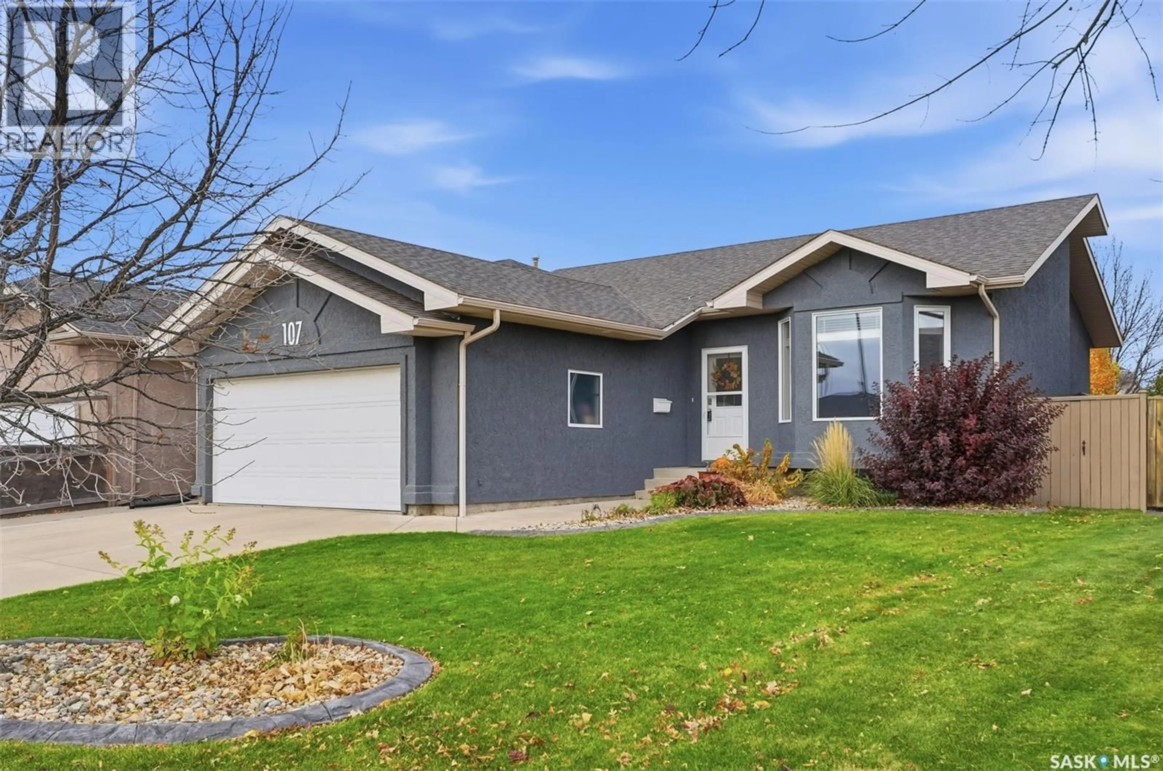 Home with vinyl exterior material, street for 107 CARR CRESCENT, Saskatoon Saskatchewan S7S1M3