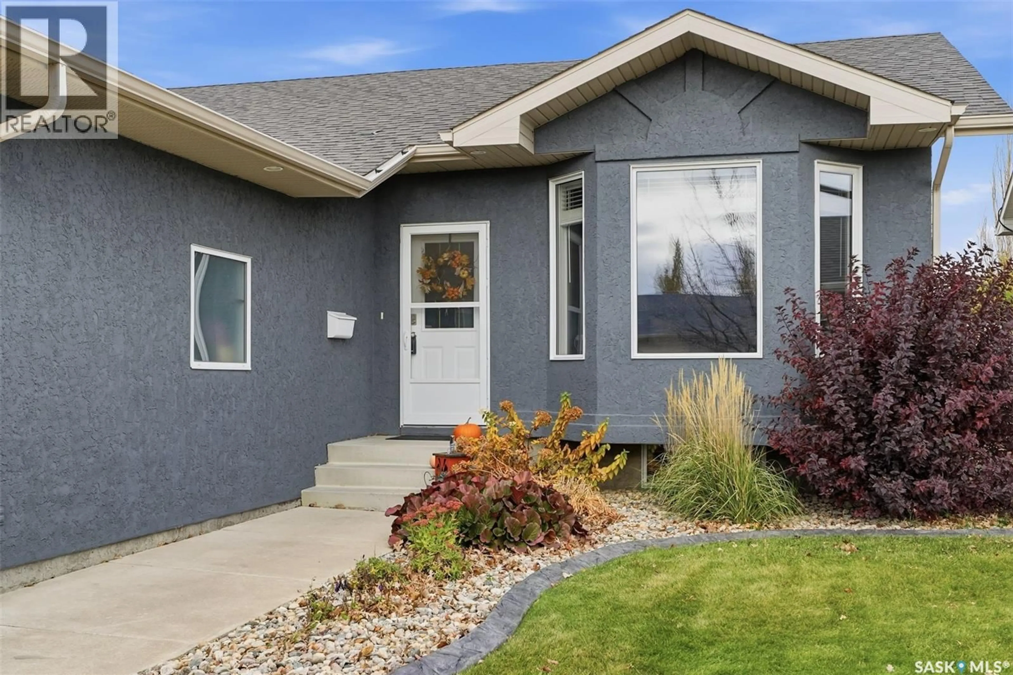 Home with vinyl exterior material, street for 107 CARR CRESCENT, Saskatoon Saskatchewan S7S1M3