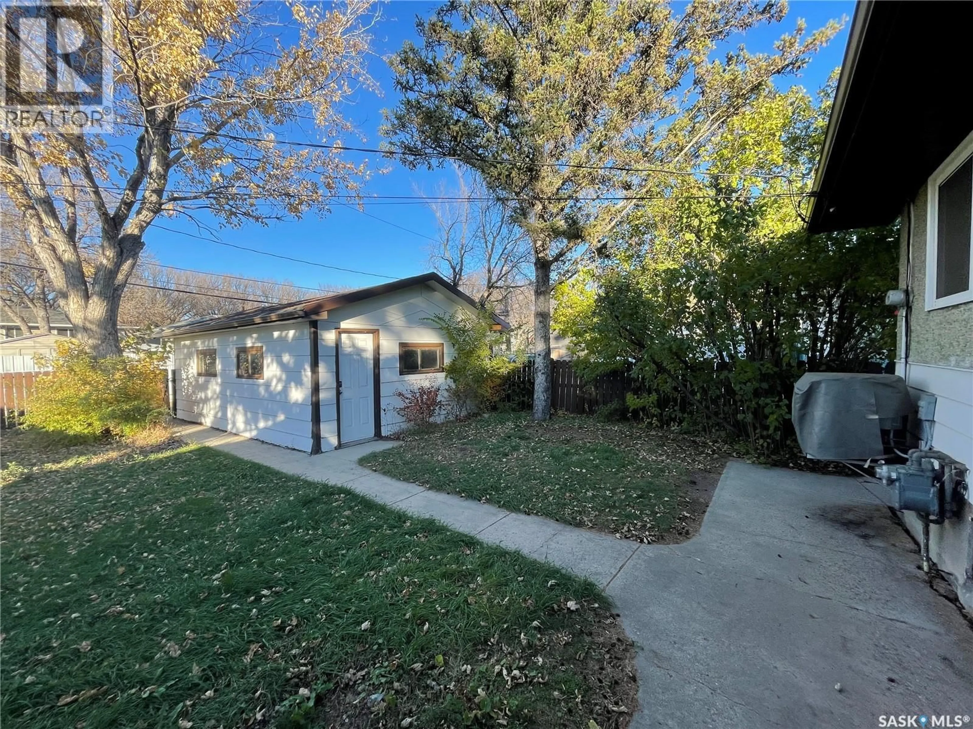 A pic from outside/outdoor area/front of a property/back of a property/a pic from drone, street for 2910 AVONHURST DRIVE, Regina Saskatchewan S4R3J5