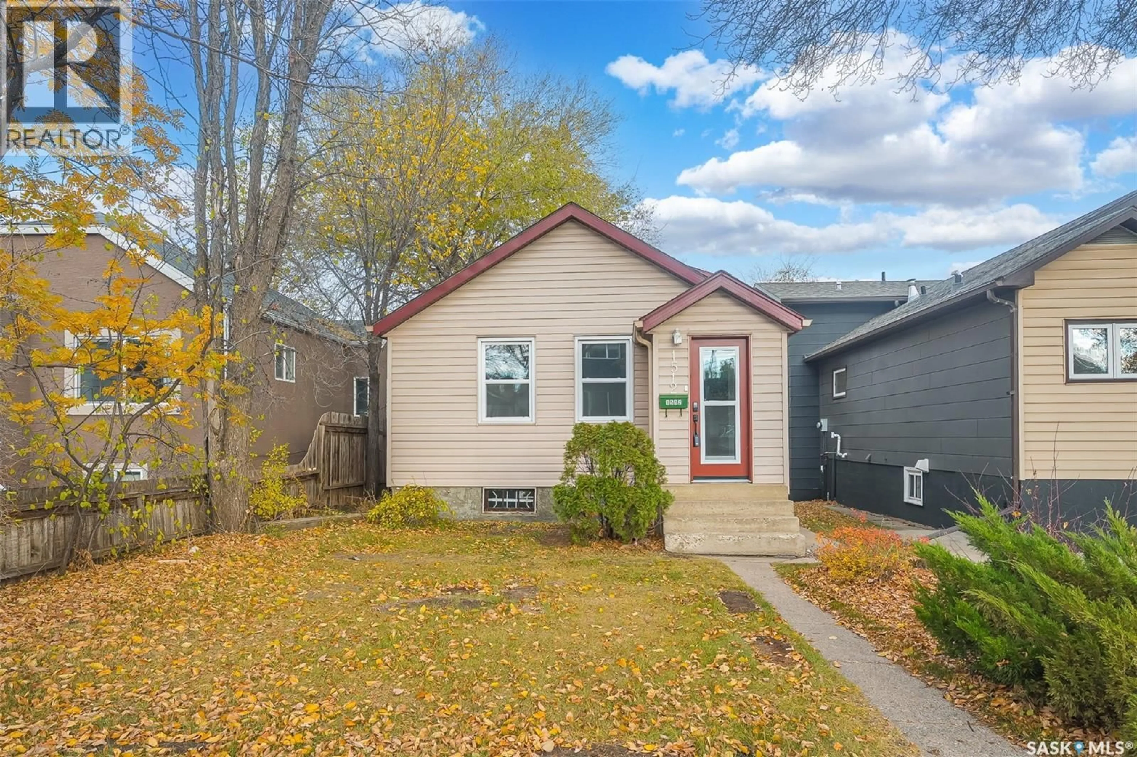 Home with vinyl exterior material, street for 1512 7TH AVENUE, Saskatoon Saskatchewan S7K2W5