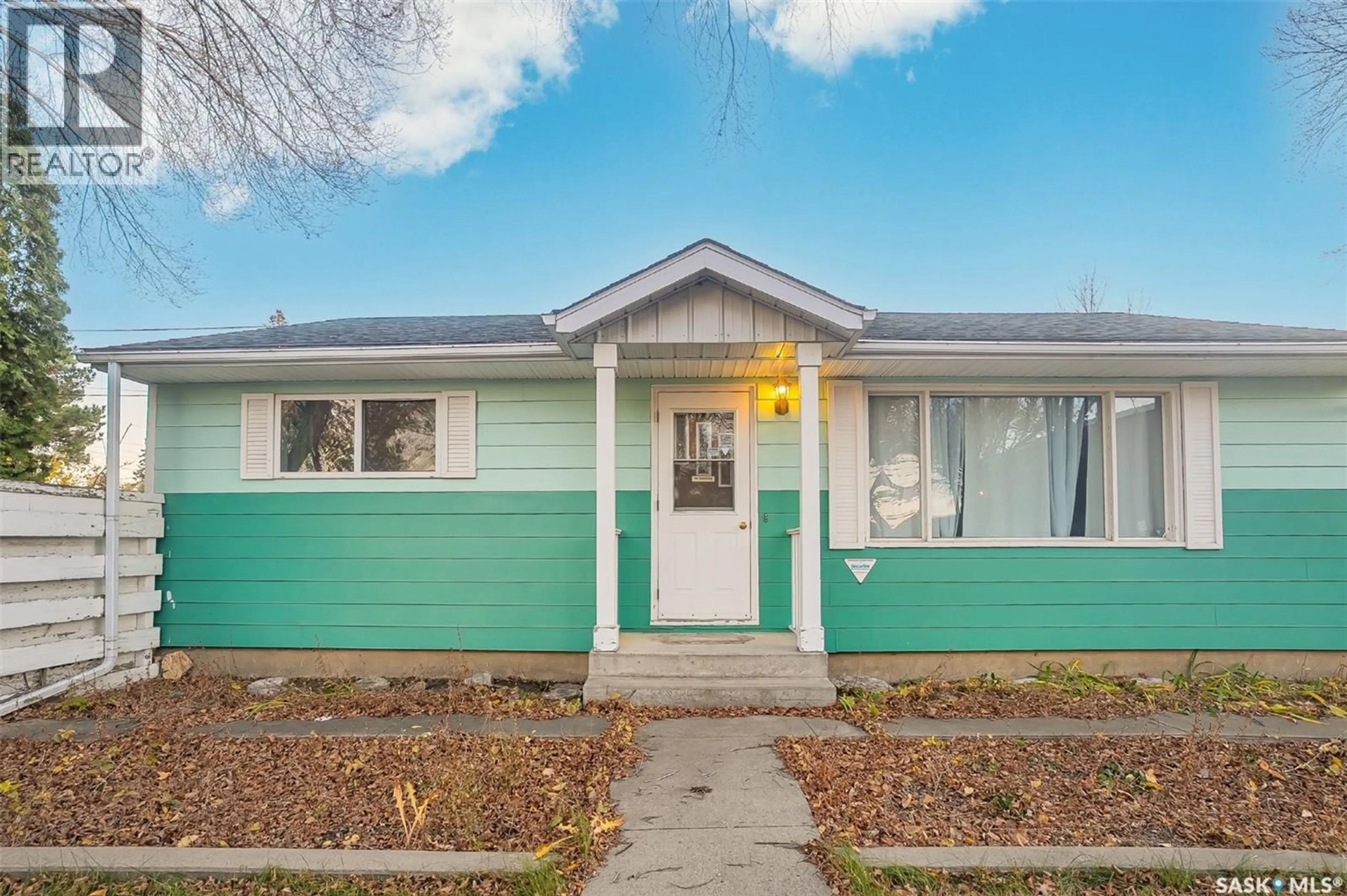 Home with vinyl exterior material, street for 338 V AVENUE, Saskatoon Saskatchewan S7L3F8