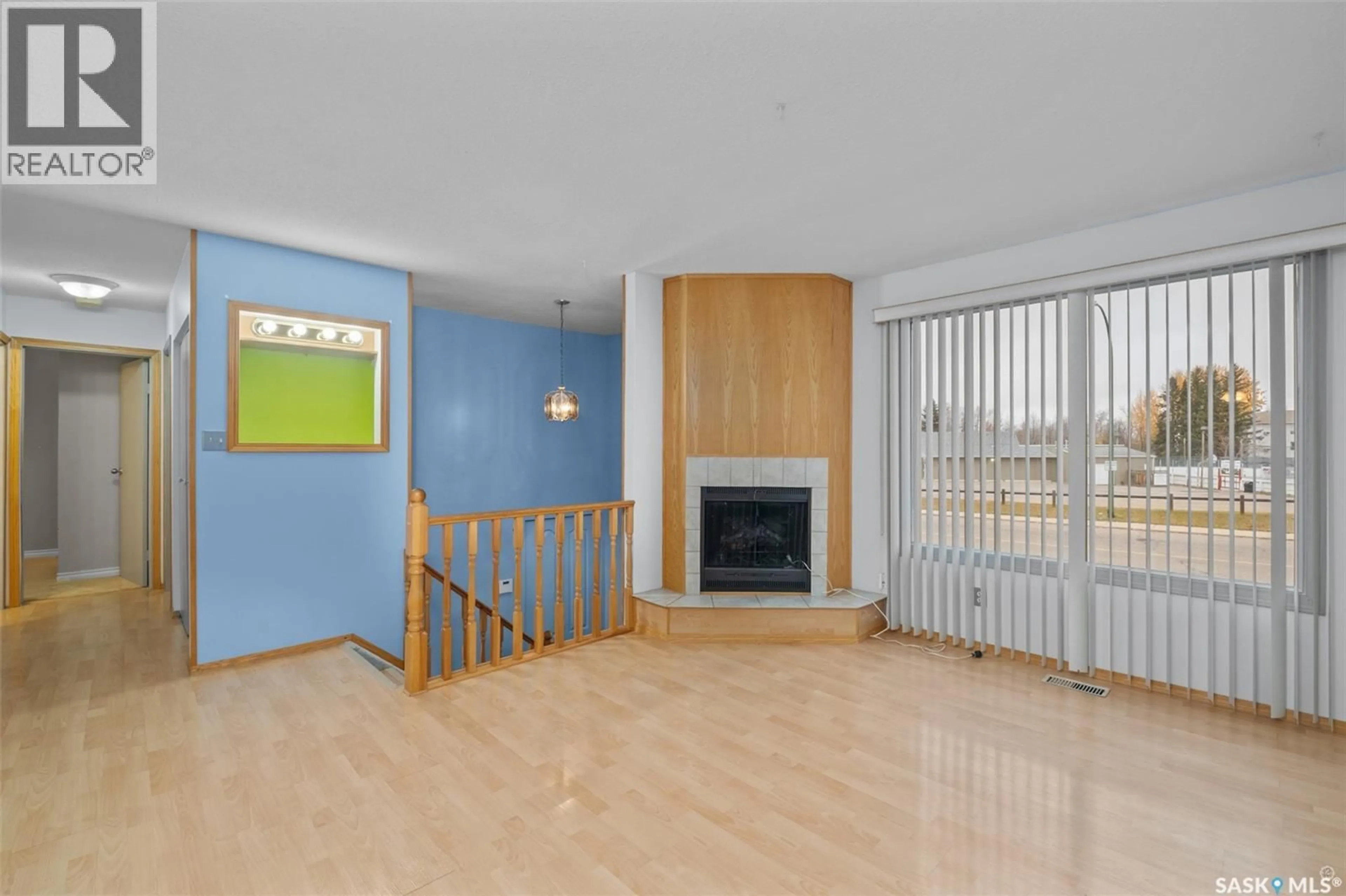 Living room with furniture, wood/laminate floor for 3107 DUNN DRIVE, Prince Albert Saskatchewan S6V6Y6