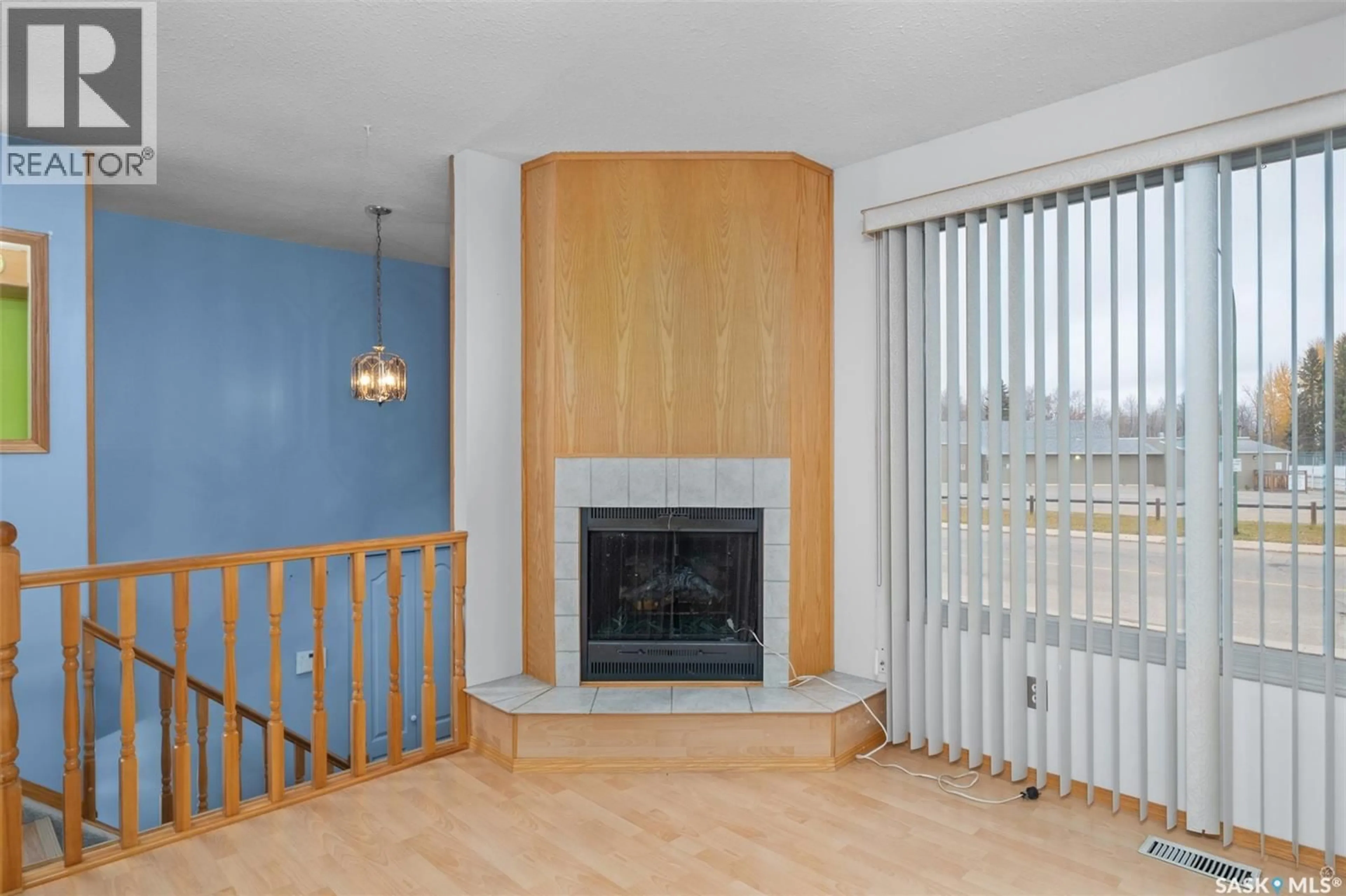 Living room with furniture, wood/laminate floor for 3107 DUNN DRIVE, Prince Albert Saskatchewan S6V6Y6