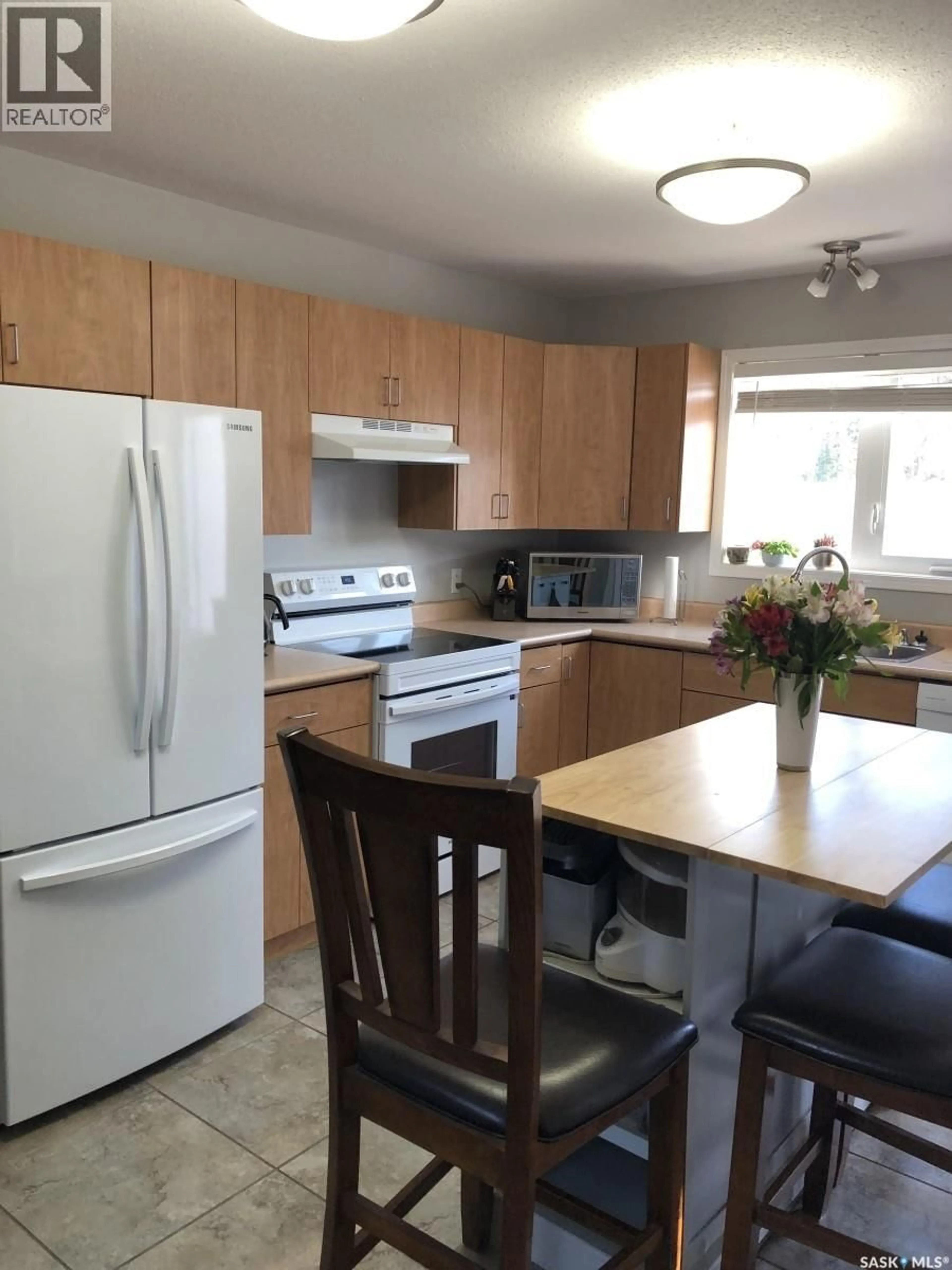 Standard kitchen, wood/laminate floor for 43 RUMBERGER ROAD, Candle Lake Saskatchewan S0J3E0