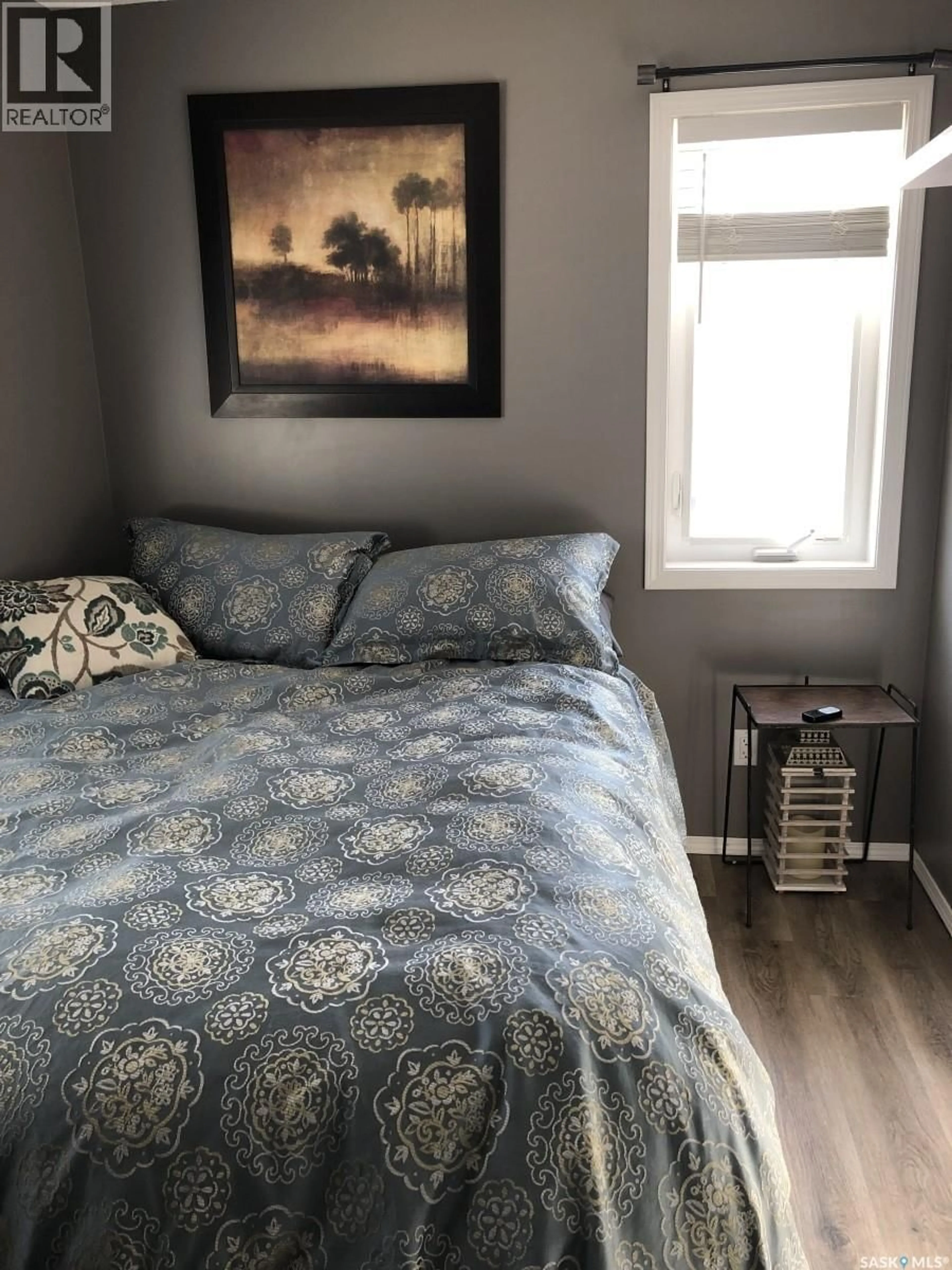 Bedroom with bed, wood/laminate floor for 43 RUMBERGER ROAD, Candle Lake Saskatchewan S0J3E0