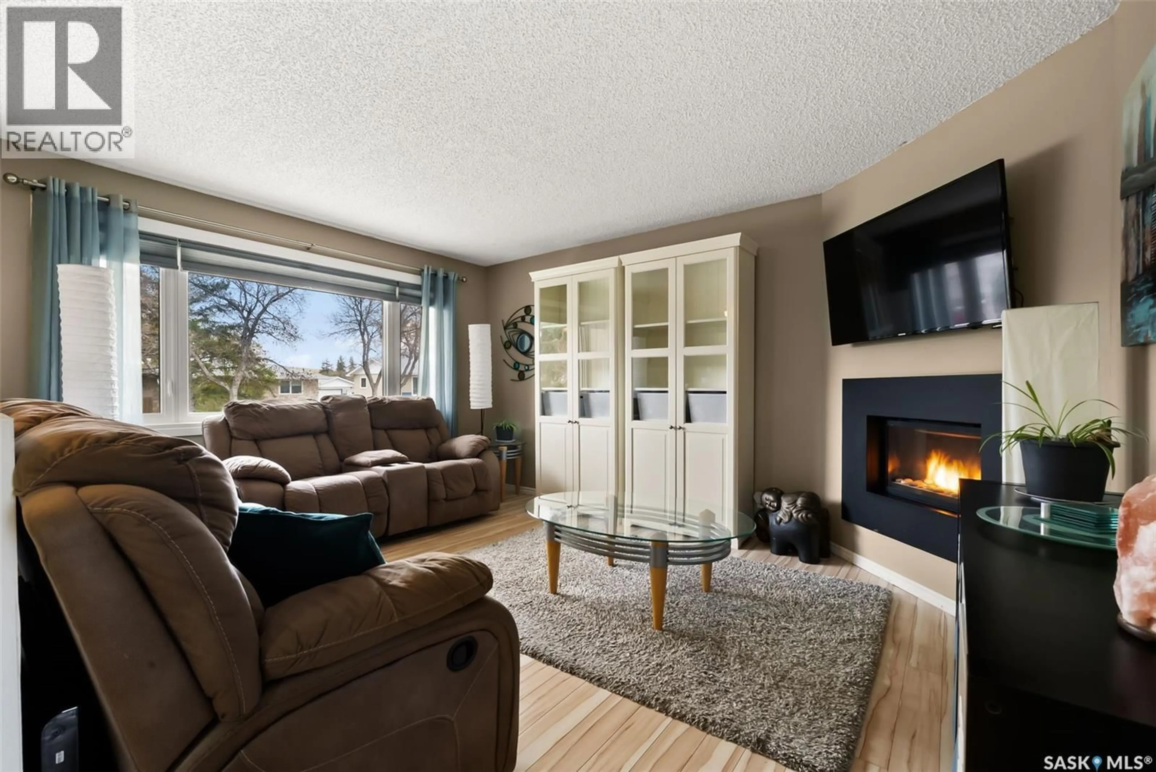 Living room with furniture, unknown for 219 LLOYD CRESCENT, Regina Saskatchewan S4R6C2