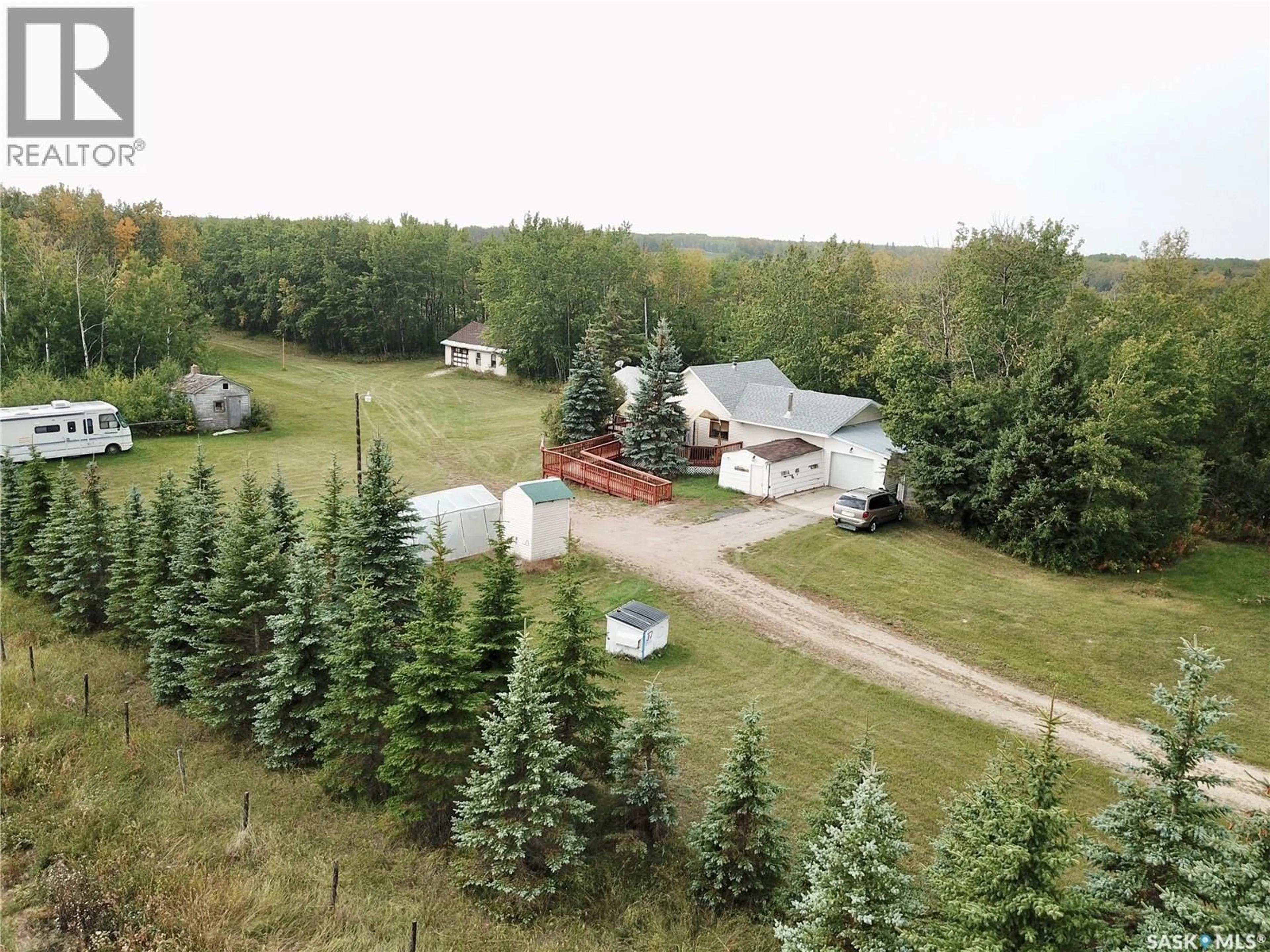 A pic from outside/outdoor area/front of a property/back of a property/a pic from drone, forest/trees view for 20264 HWY 3 ACREAGE, Spiritwood Rm No. 496 Saskatchewan S0J2M0
