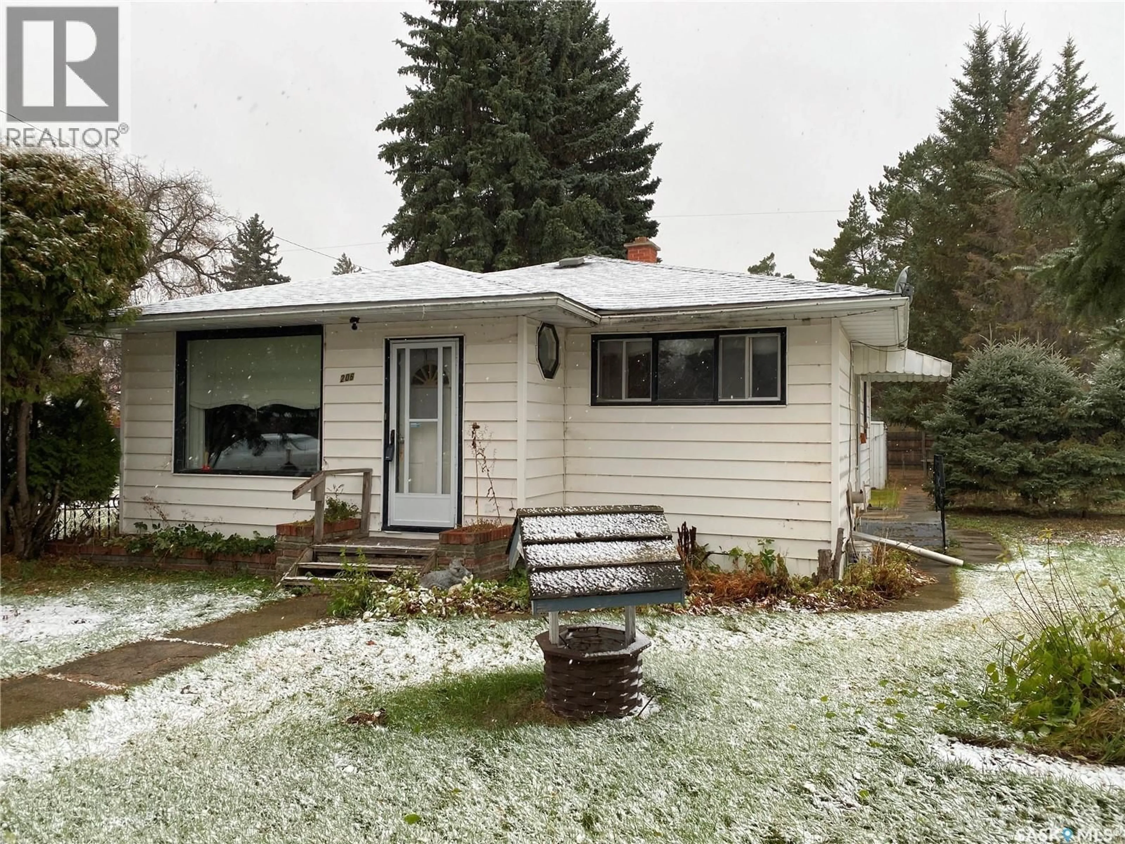 Home with vinyl exterior material, street for 206 WATSON STREET, Lipton Saskatchewan S0G3B0
