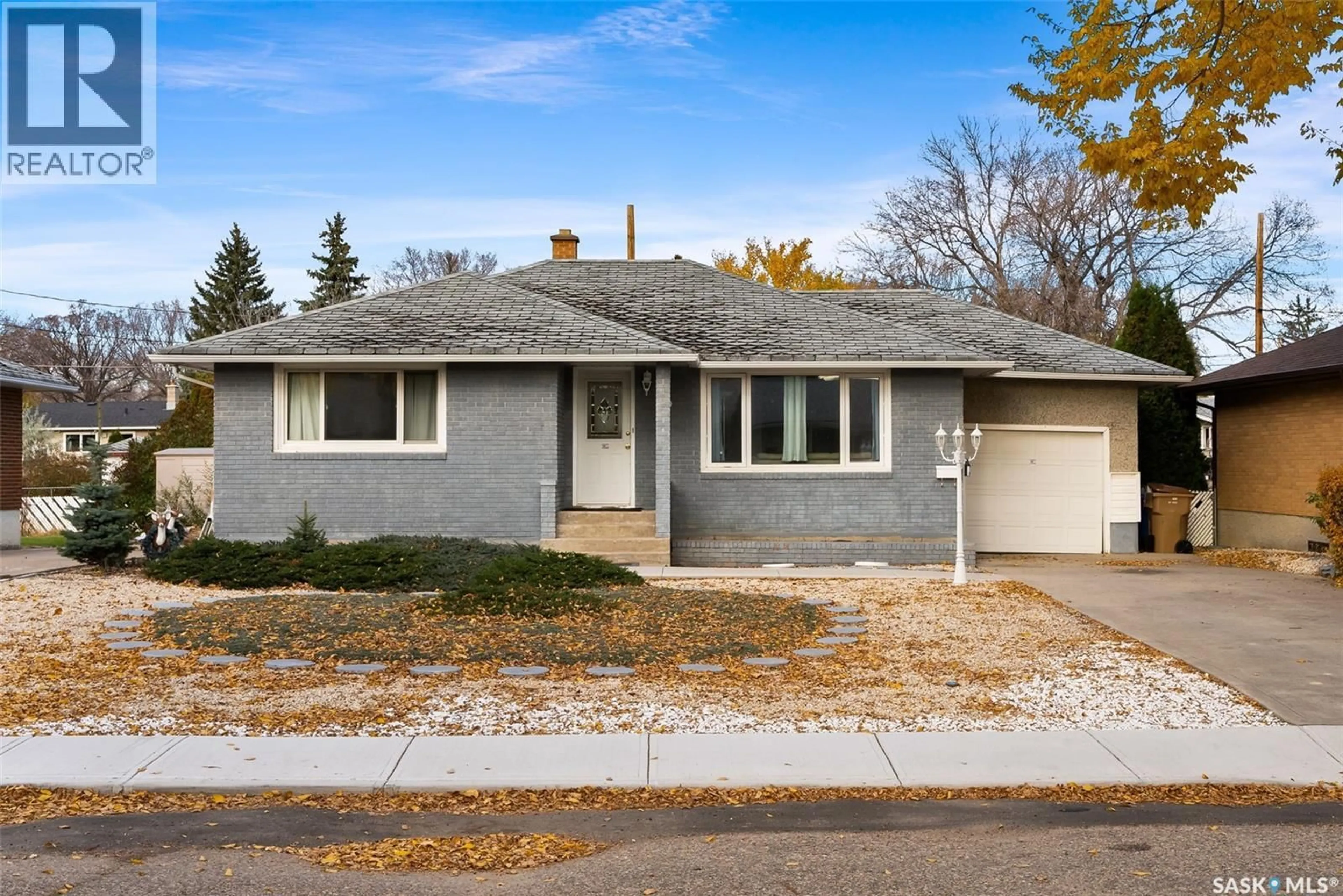 Home with vinyl exterior material, street for 19 JOHNSTONE STREET, Regina Saskatchewan S4R4R3