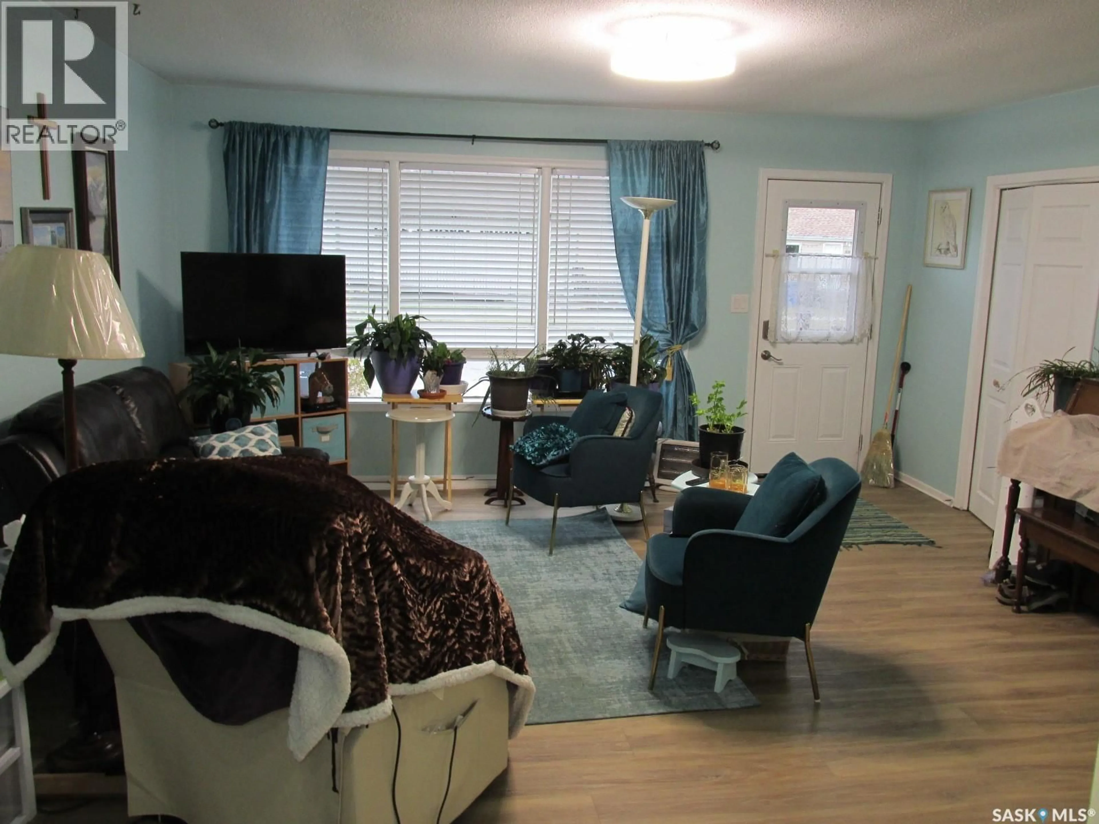 Living room with furniture, unknown for 311 1ST STREET, Nipawin Saskatchewan S0E1E0