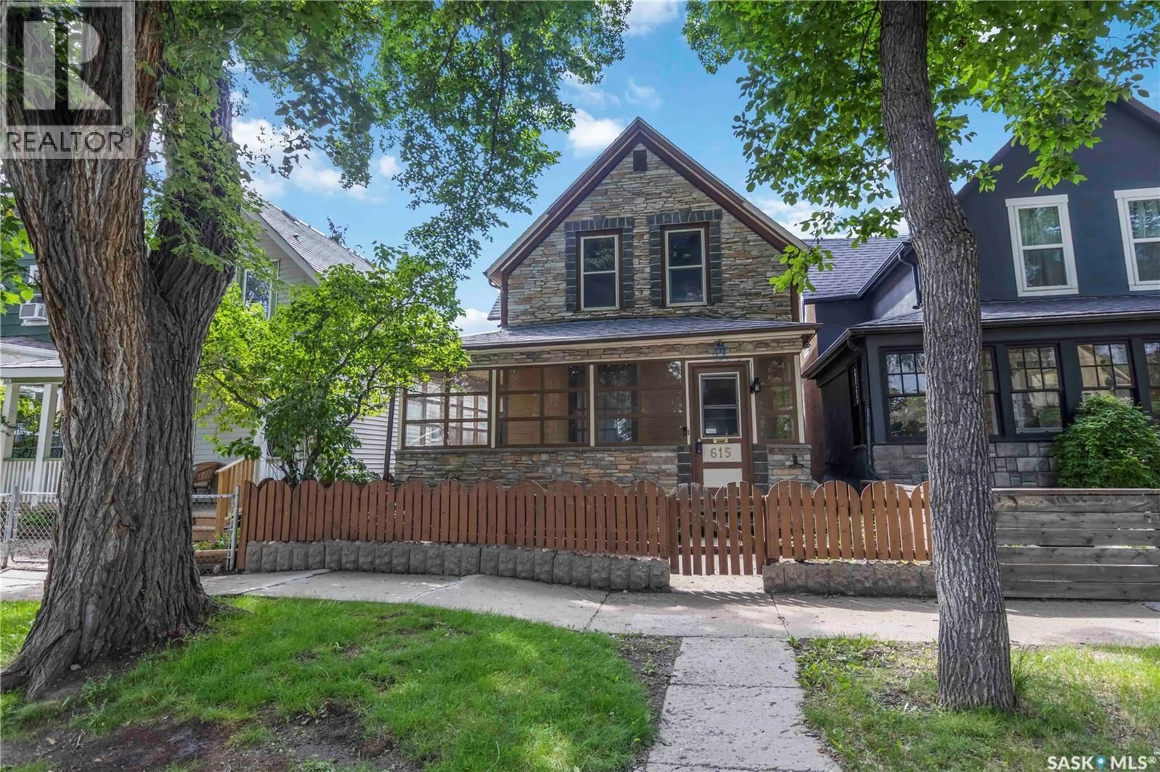Home with brick exterior material, street for 615 G AVENUE, Saskatoon Saskatchewan S7M1V8