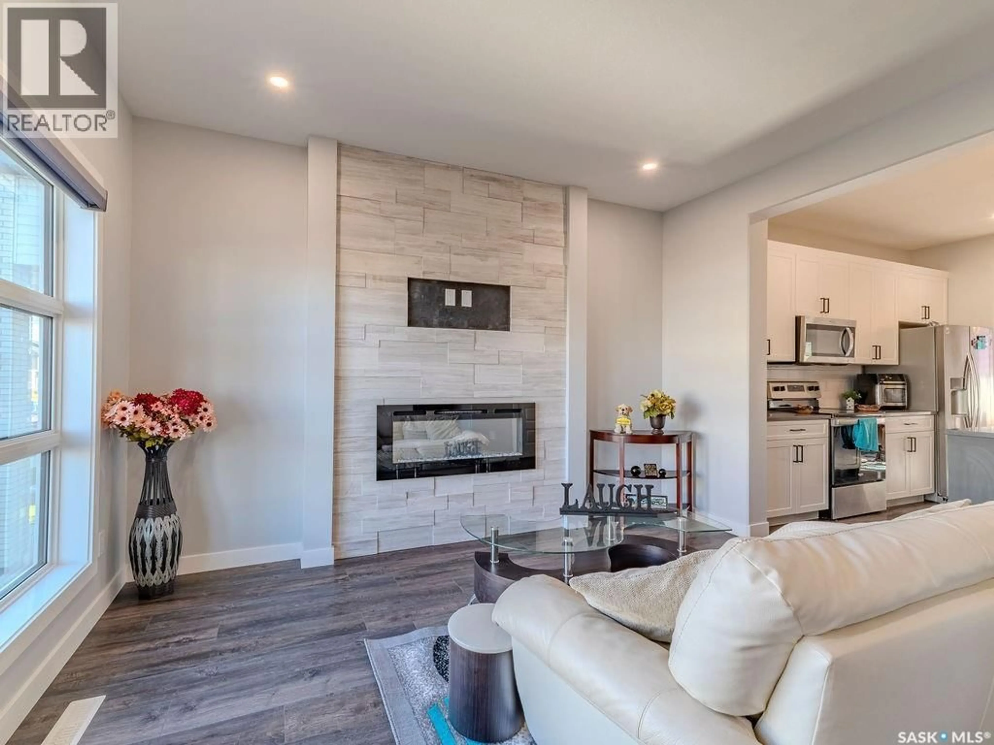 Living room with furniture, ceramic/tile floor for 306 BRIGHTON BOULEVARD, Saskatoon Saskatchewan S7V0V8