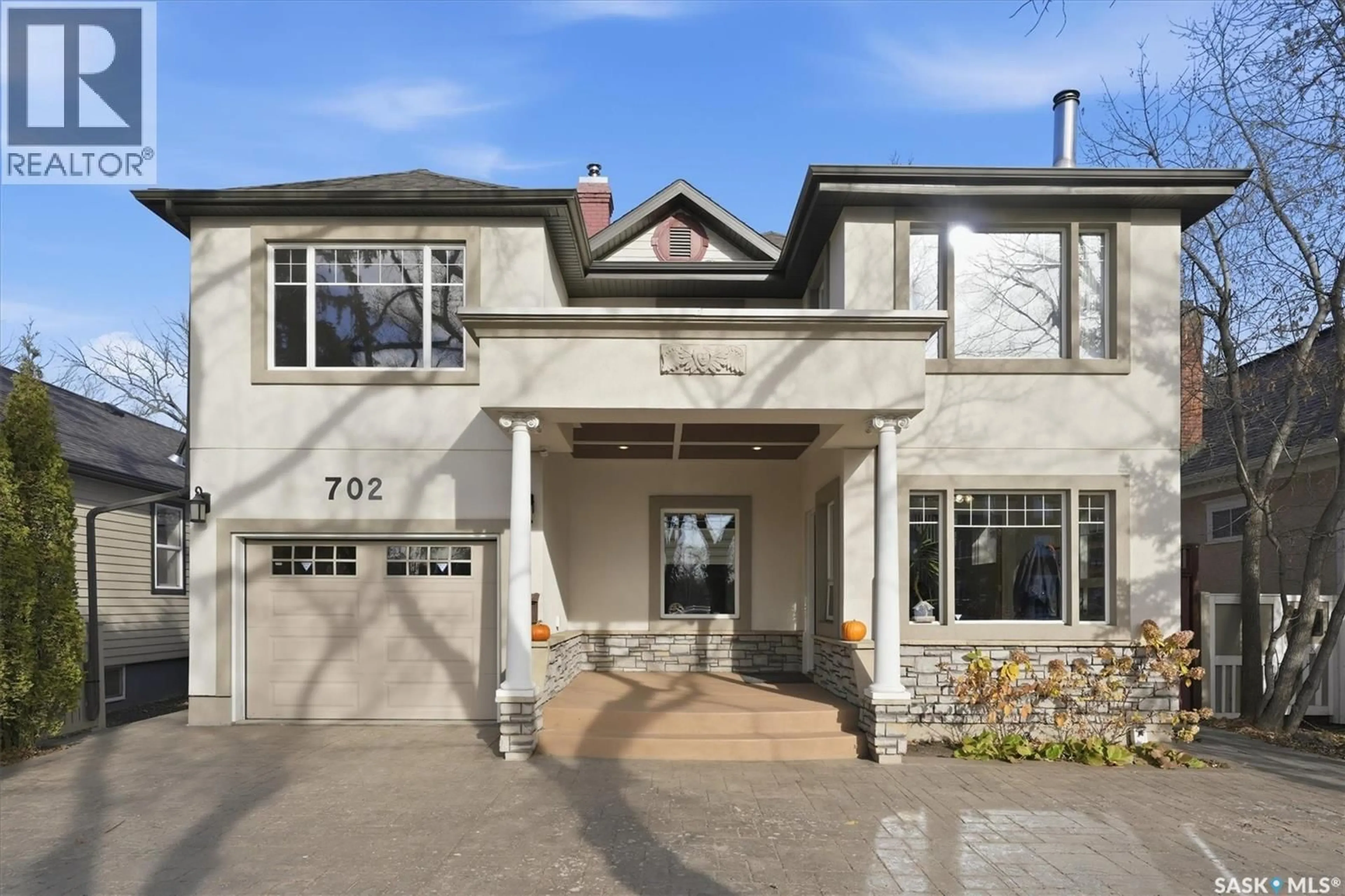 Home with brick exterior material, street for 702 QUEEN STREET, Saskatoon Saskatchewan S7K0M9