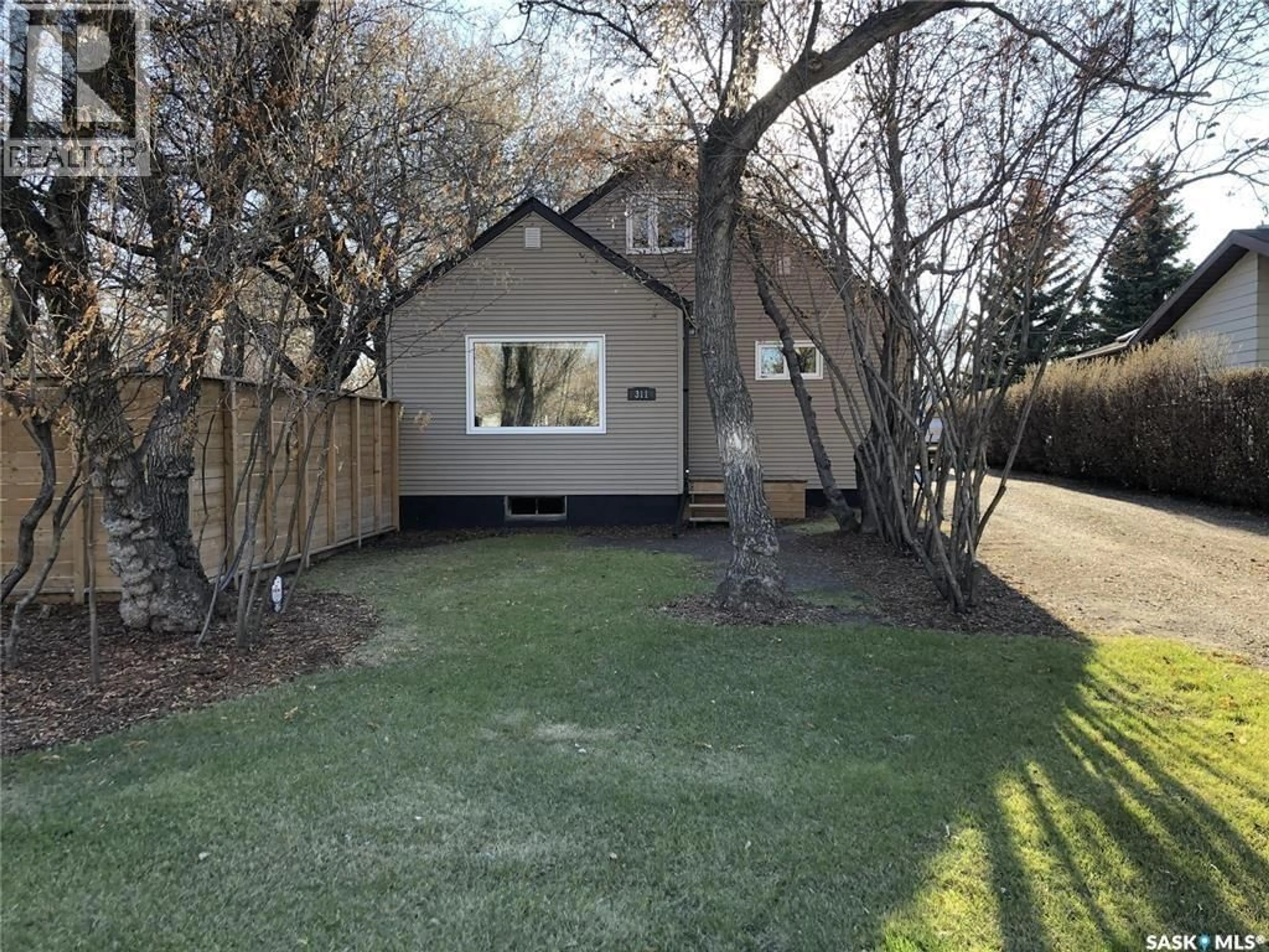 A pic from outside/outdoor area/front of a property/back of a property/a pic from drone, street for 311 7TH STREET, Wynyard Saskatchewan S0A4T0