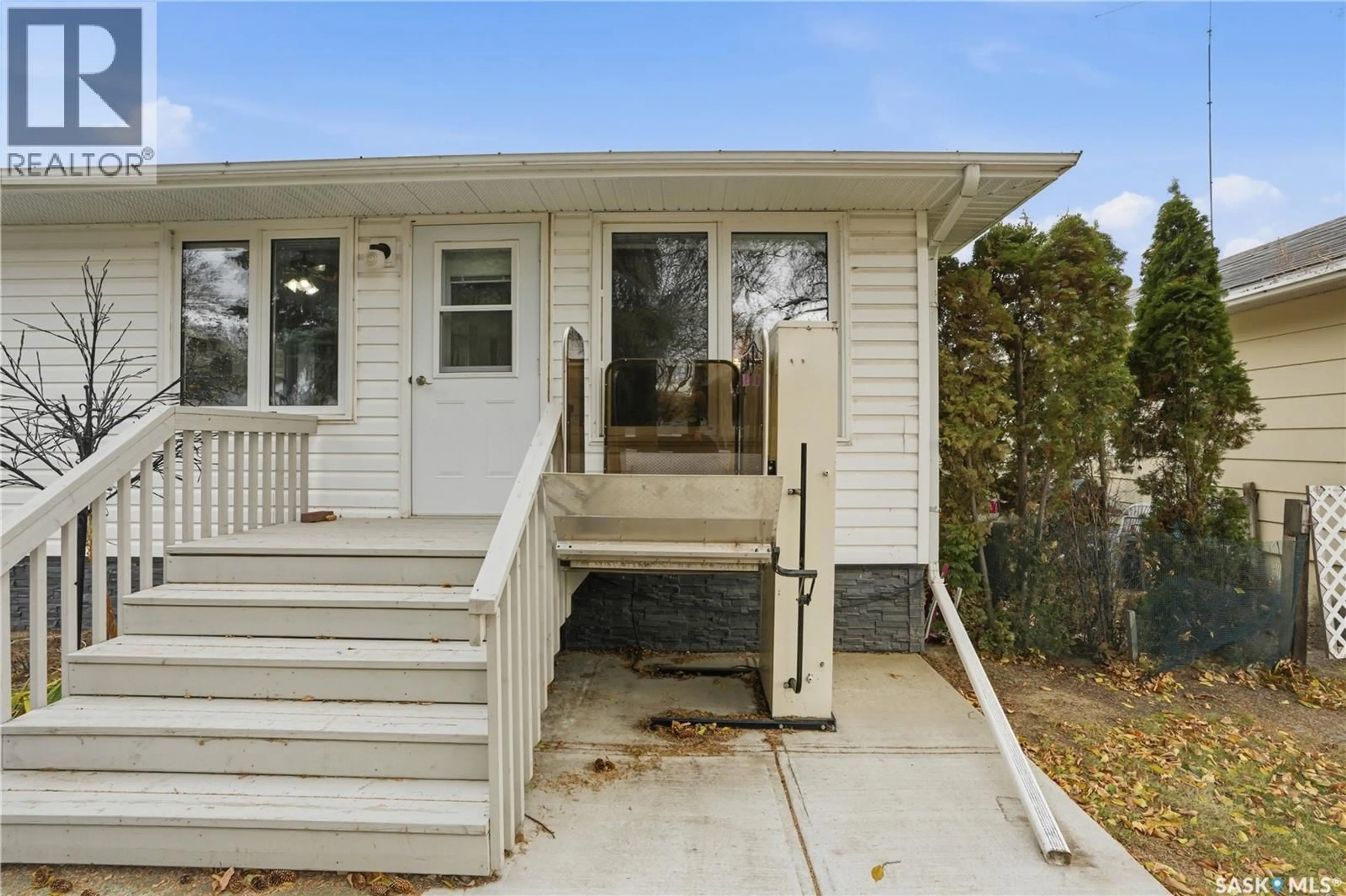 Home with vinyl exterior material, street for 319 SIMPSON STREET, Outlook Saskatchewan S0L2N0