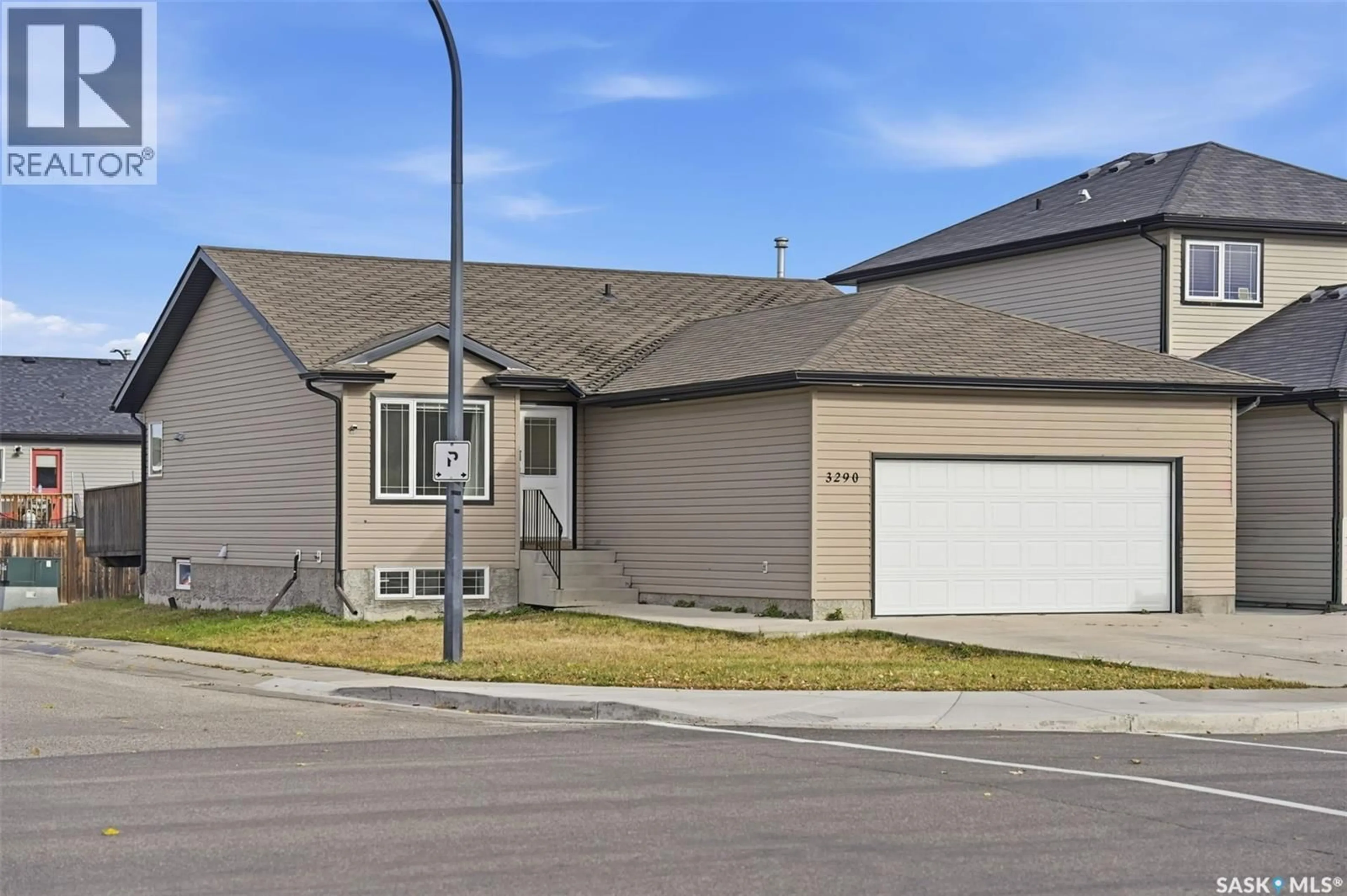 Home with vinyl exterior material, street for 3290 MCCLOCKLIN ROAD, Saskatoon Saskatchewan S7R0B9
