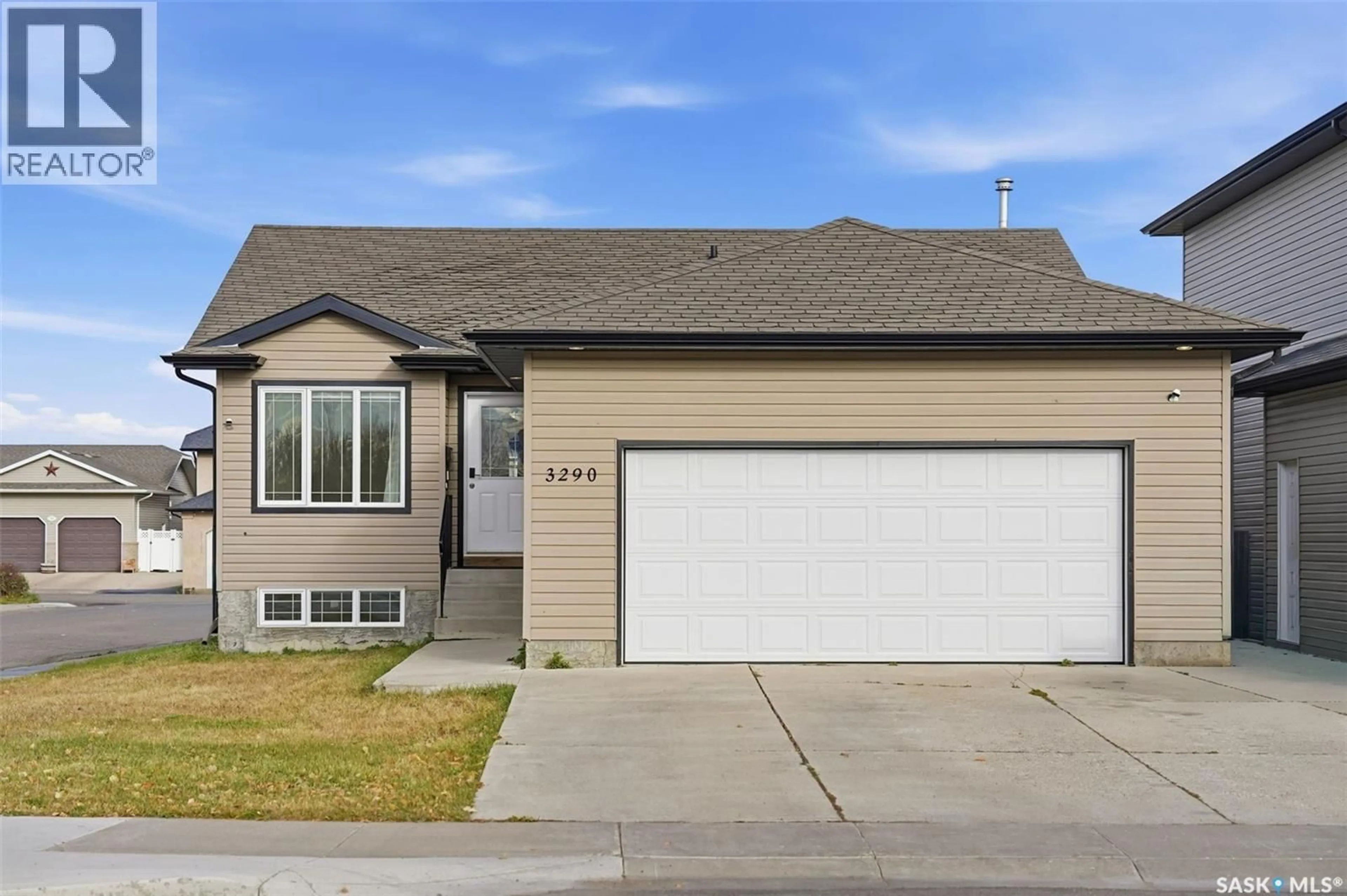 Home with vinyl exterior material, street for 3290 MCCLOCKLIN ROAD, Saskatoon Saskatchewan S7R0B9