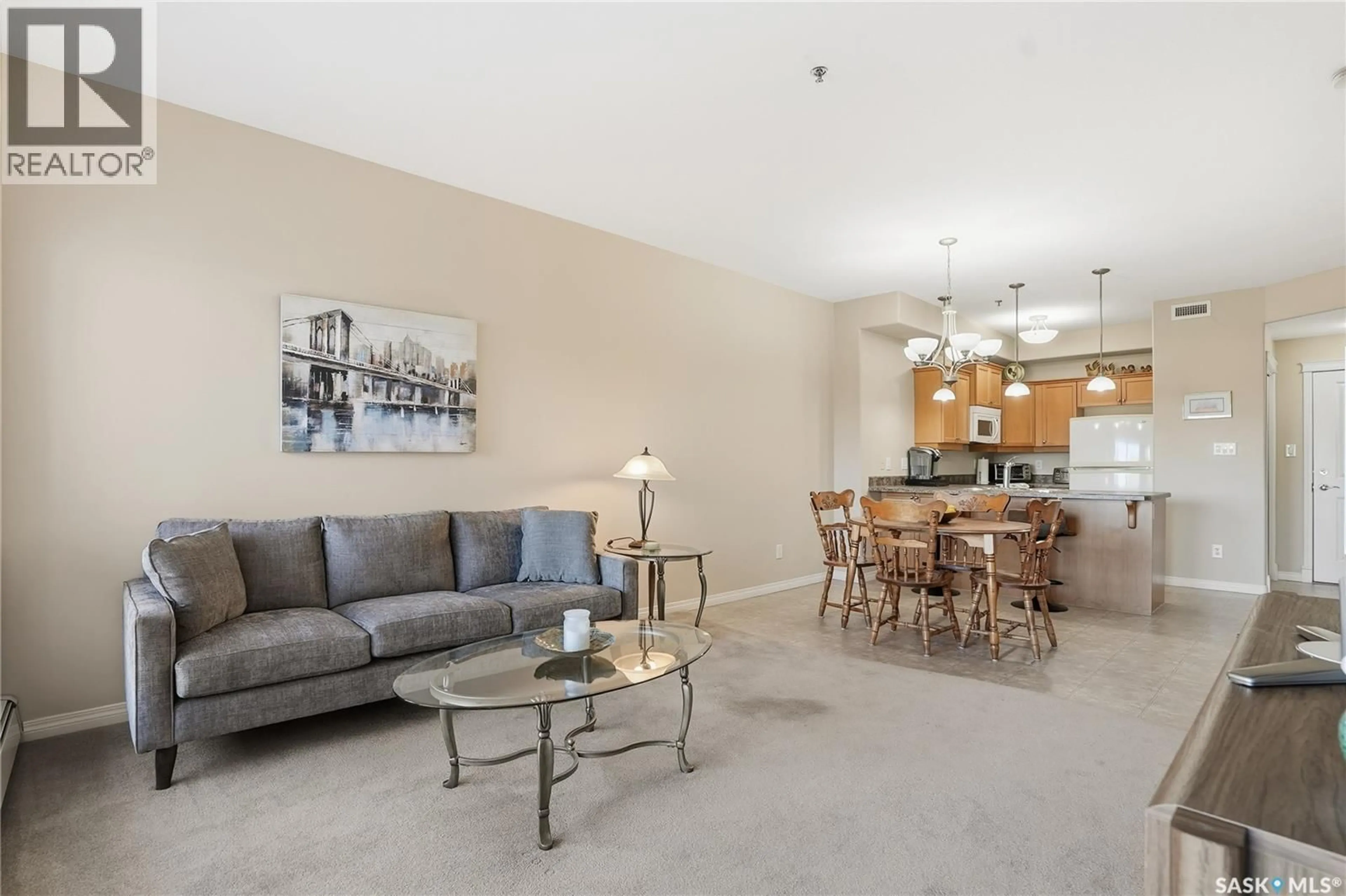 Living room with furniture, unknown for 204 102 ARMISTICE WAY, Saskatoon Saskatchewan S7J2Z6