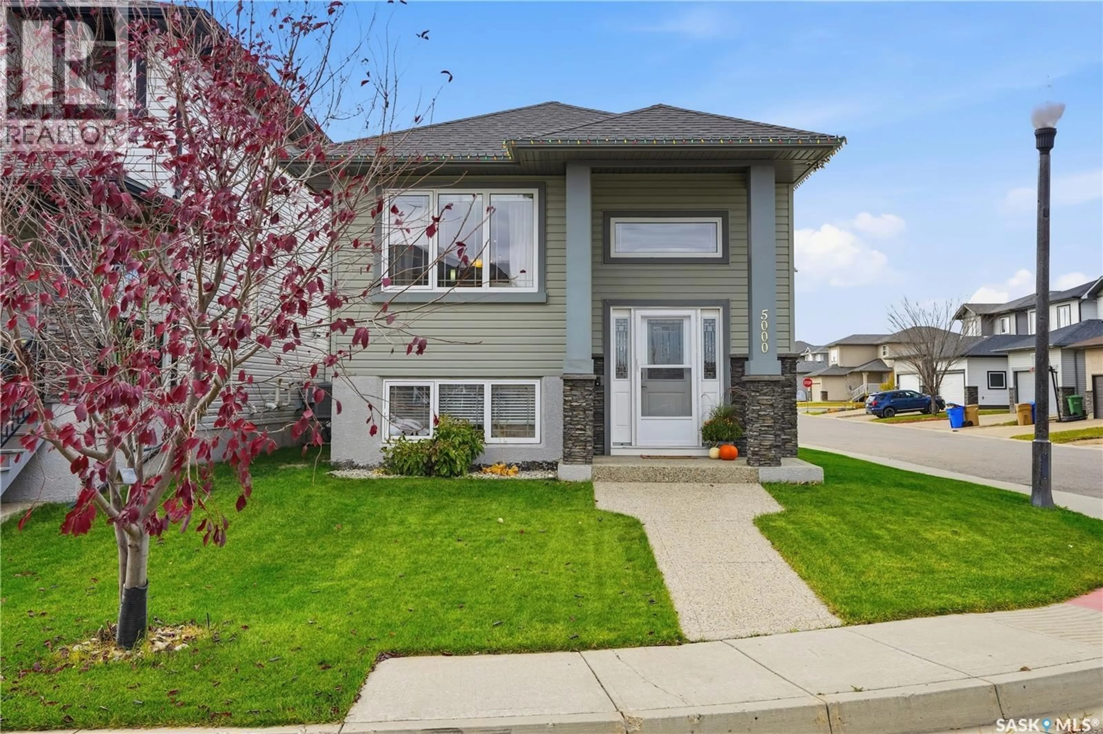 Home with vinyl exterior material, street for 5000 AERIAL CRESCENT, Regina Saskatchewan S4W0C9