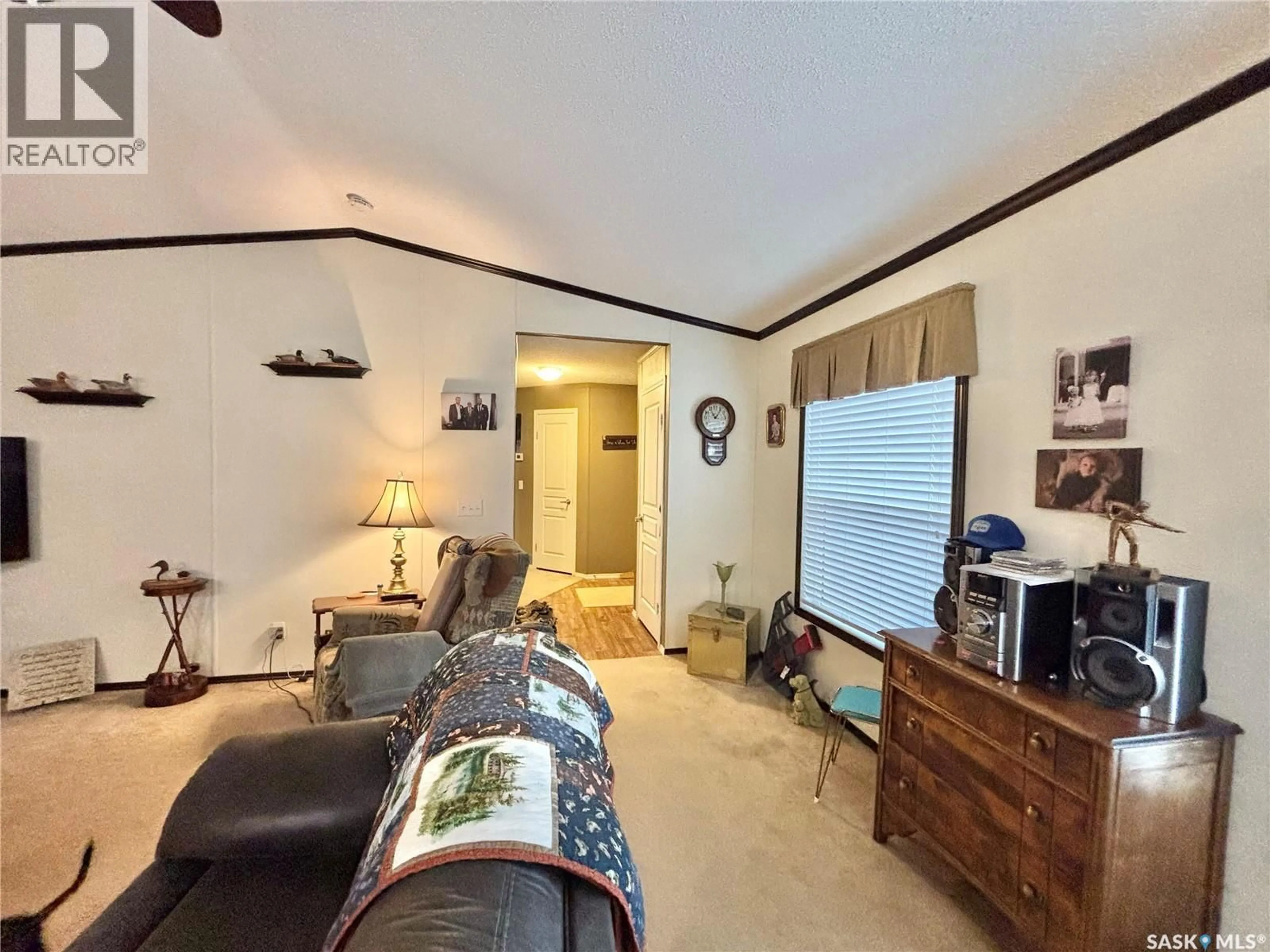 Living room with furniture, unknown for 47 WESTSHORE GREENS, Yorkton Saskatchewan S3N2V4