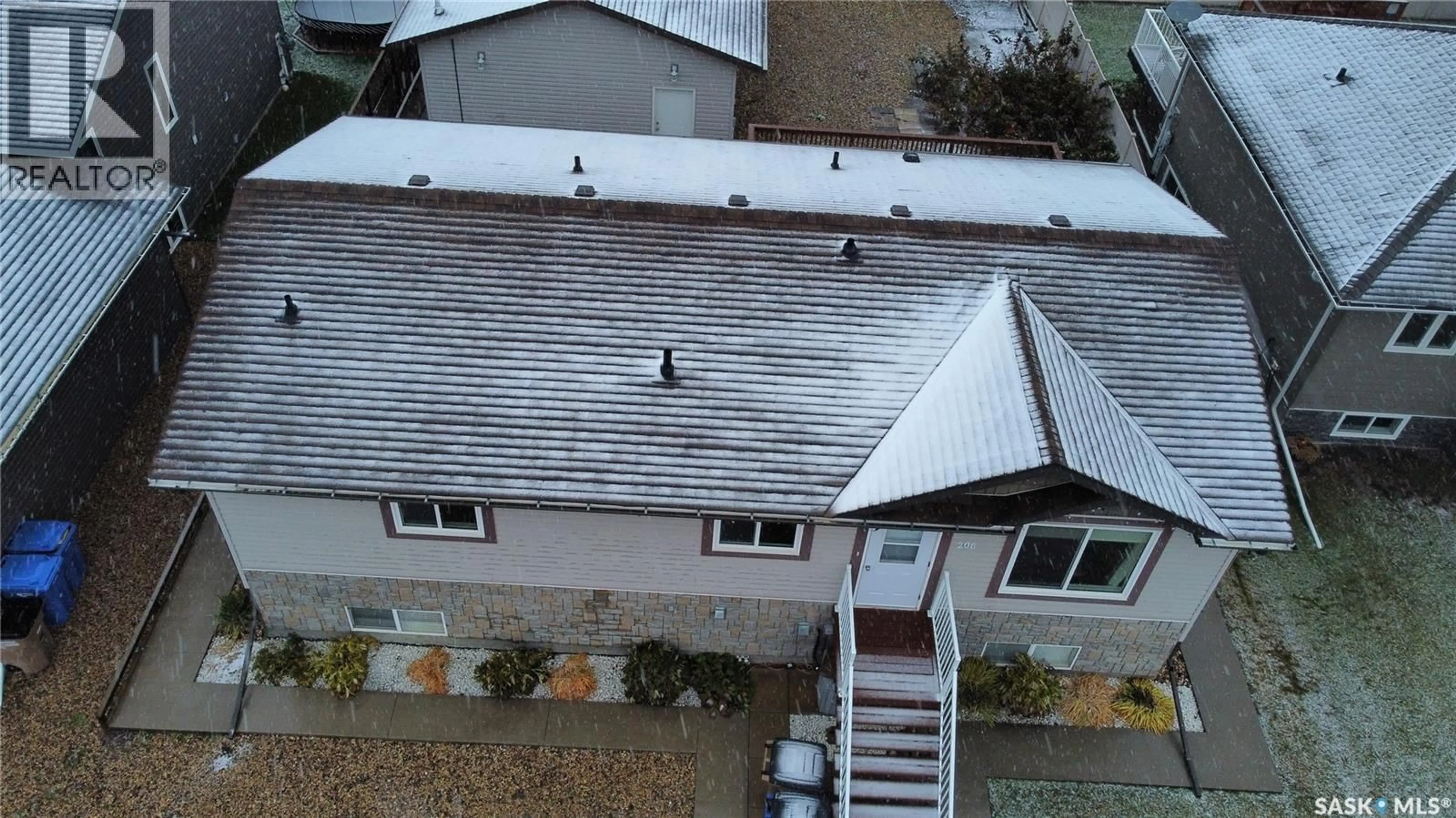A pic from outside/outdoor area/front of a property/back of a property/a pic from drone, unknown for 206 ELIZABETH STREET, Melfort Saskatchewan S0E1A0